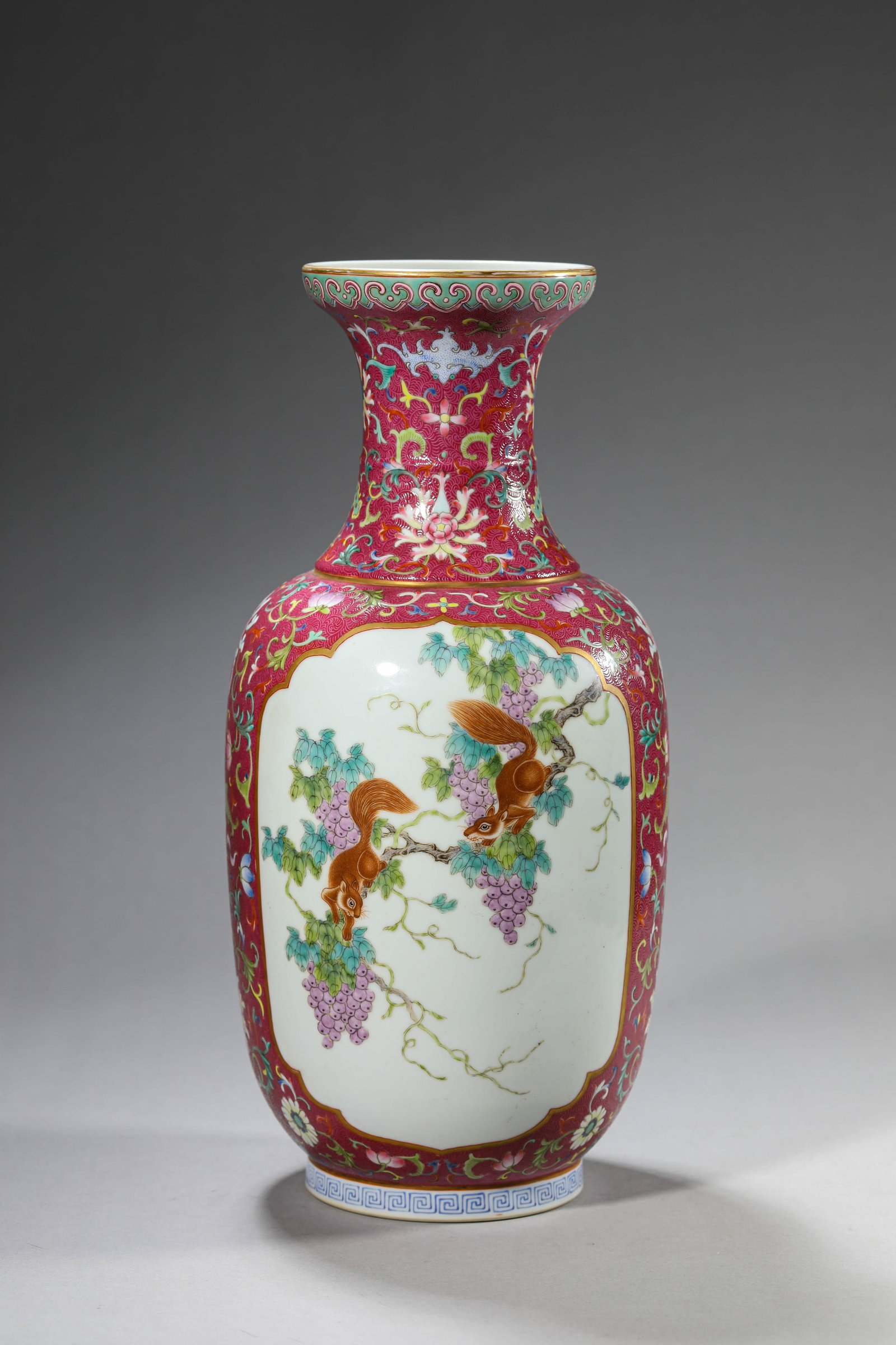 A Famille-Rose 'Squirrel and Grape Reserves' Vase: Dimensions: Width: 15.1 cm (5.94 in) x Height: 32.5 cm (12.80 in). All measurements are approximate.