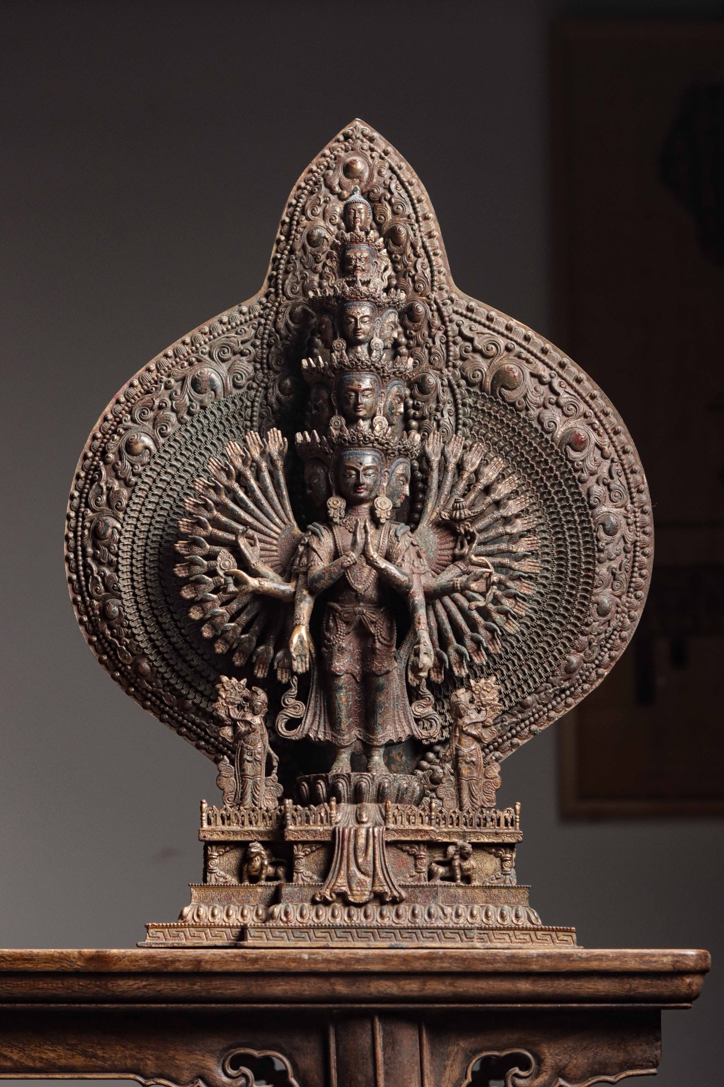 A Gilt Bronze Statue of Thousand-Handed Avalokiteshvara,Qing Dynasty: Gilt Bronze Statue of Thousand-Handed AvalokiteshvaraQing DynastyWeight: 11 JinDimensions: Height 51 cm, Width 35 cm, Depth 13 cmThe statue presents a dignified and compassionate look with slightly lo