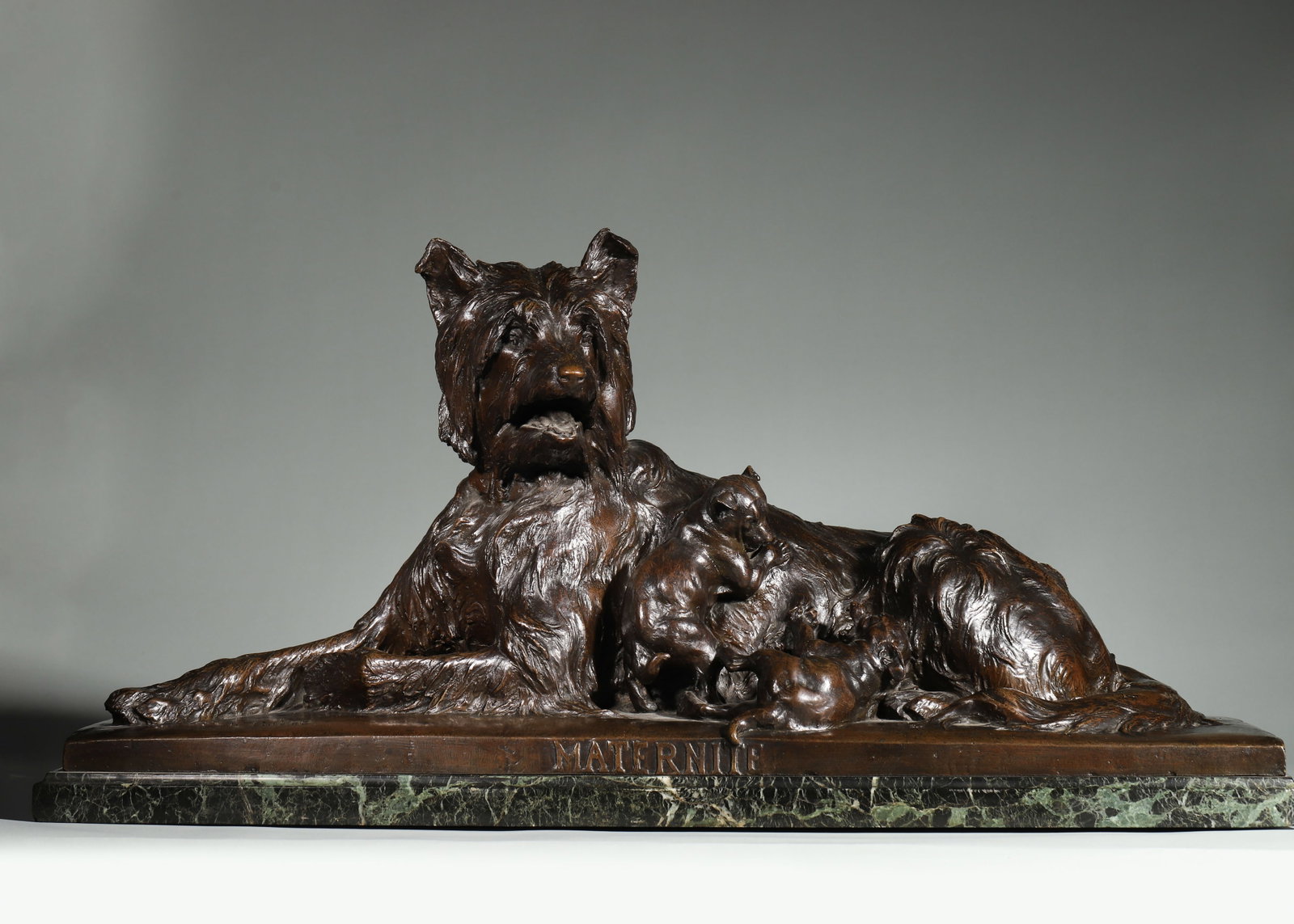 French artist Charles Paillet bronze sculpture Maternit??, depicting a shepherd dog with her puppies: L74cm(29.13 in) W29.5cm(11.61 in) H37cm(14.57 in)French artist Charles Paillet bronze sculpture Maternit??, depicting a shepherd dog with her puppies. Crafted in brown bronze with a marble base, the p