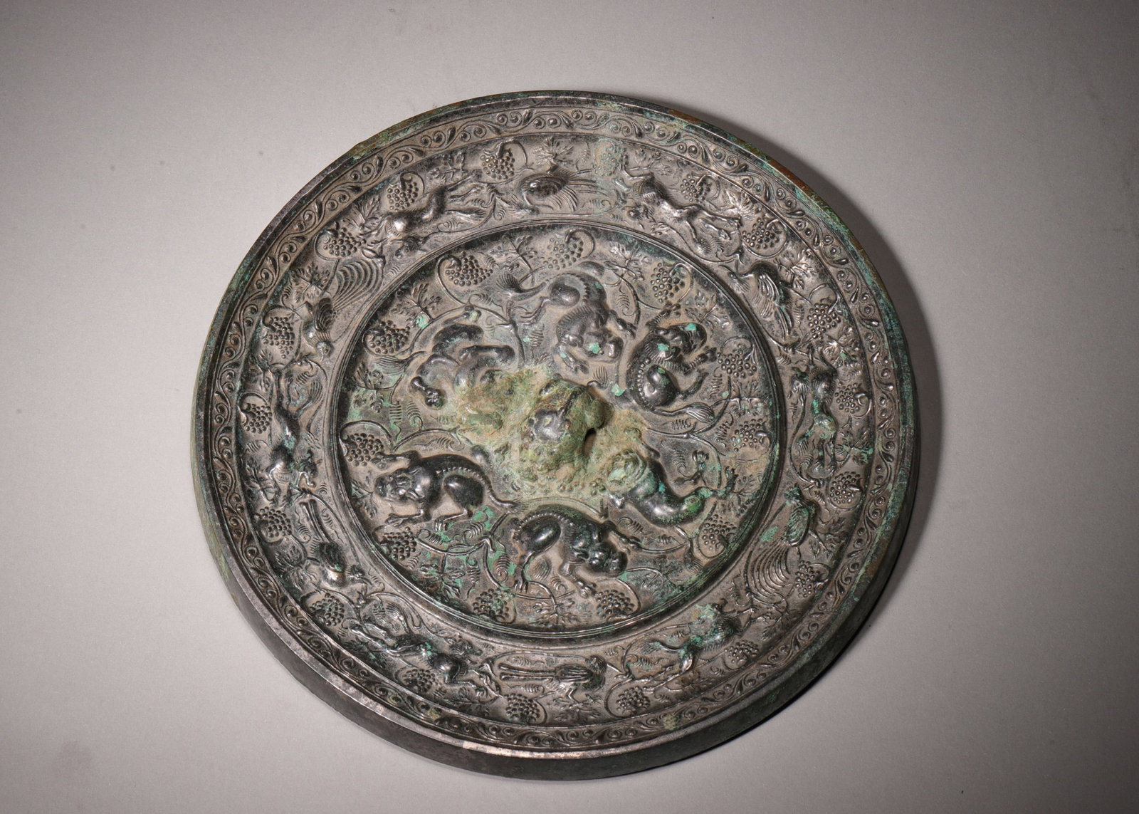 A Bronze Mirror with Sea Beasts and Grape Vines Pattern, Tang Dynasty (1 of 8)