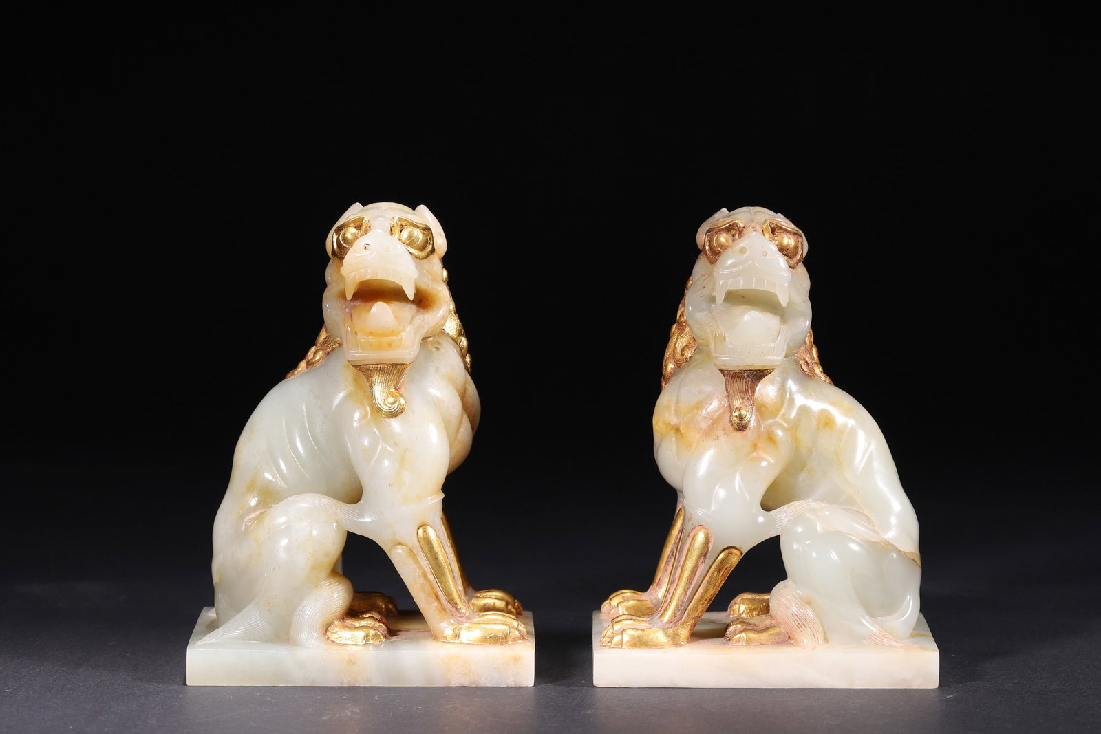 A Pair of Hetian White Jade Lions with Gilt Inlay, Tang Dynasty (1 of 10)