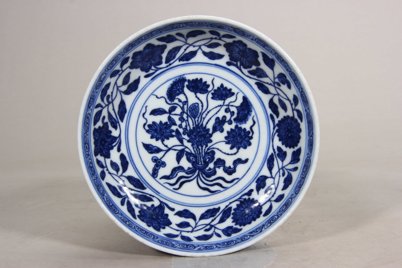 A Blue and White "Bouquet of Lotus" Dish, Qianlong Period, Qing Dynasty (1 of 9)