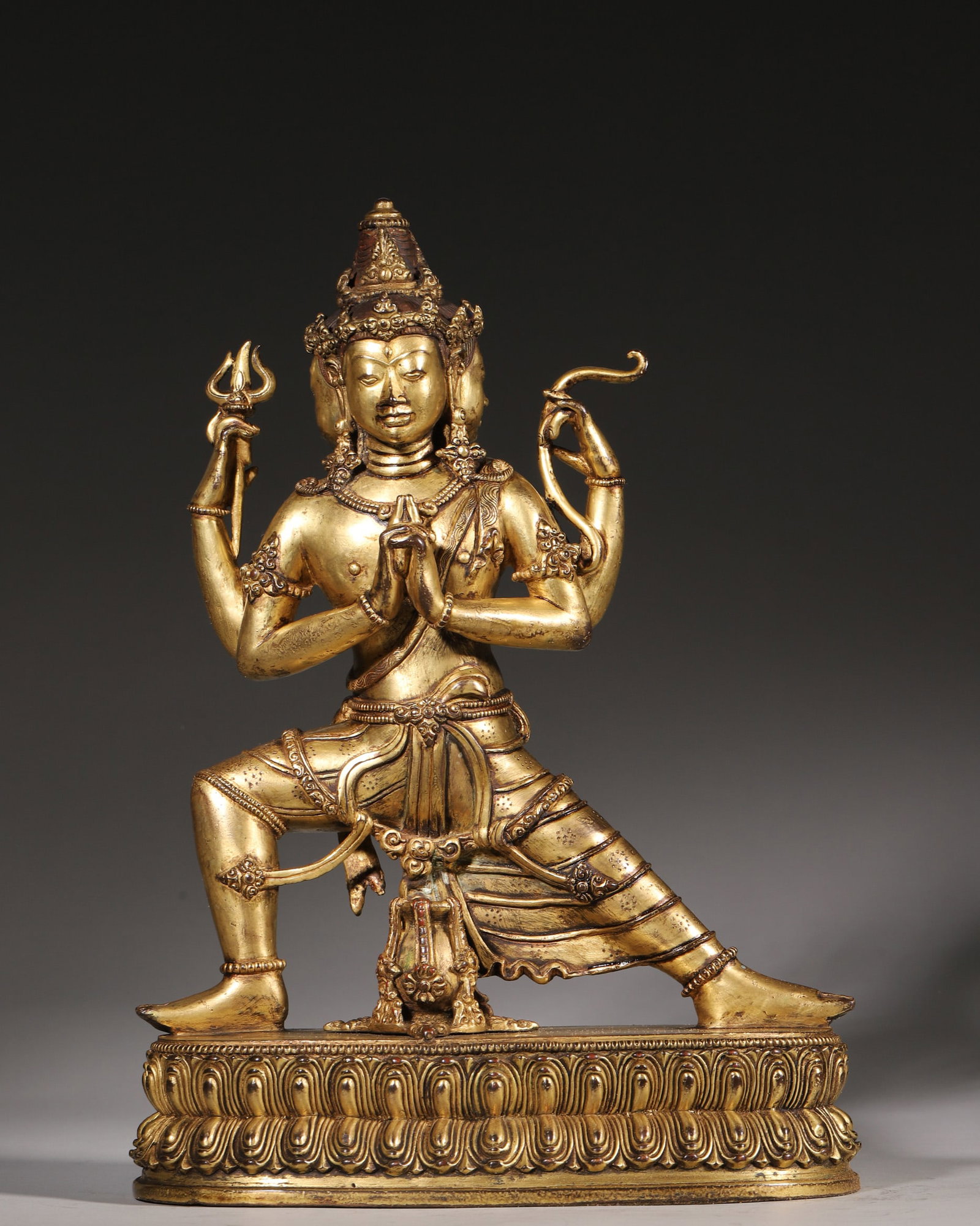 A Gilt Bronze Statue of Four-Armed and Three-Faced Protector, Qing Dynasty (1 of 9)