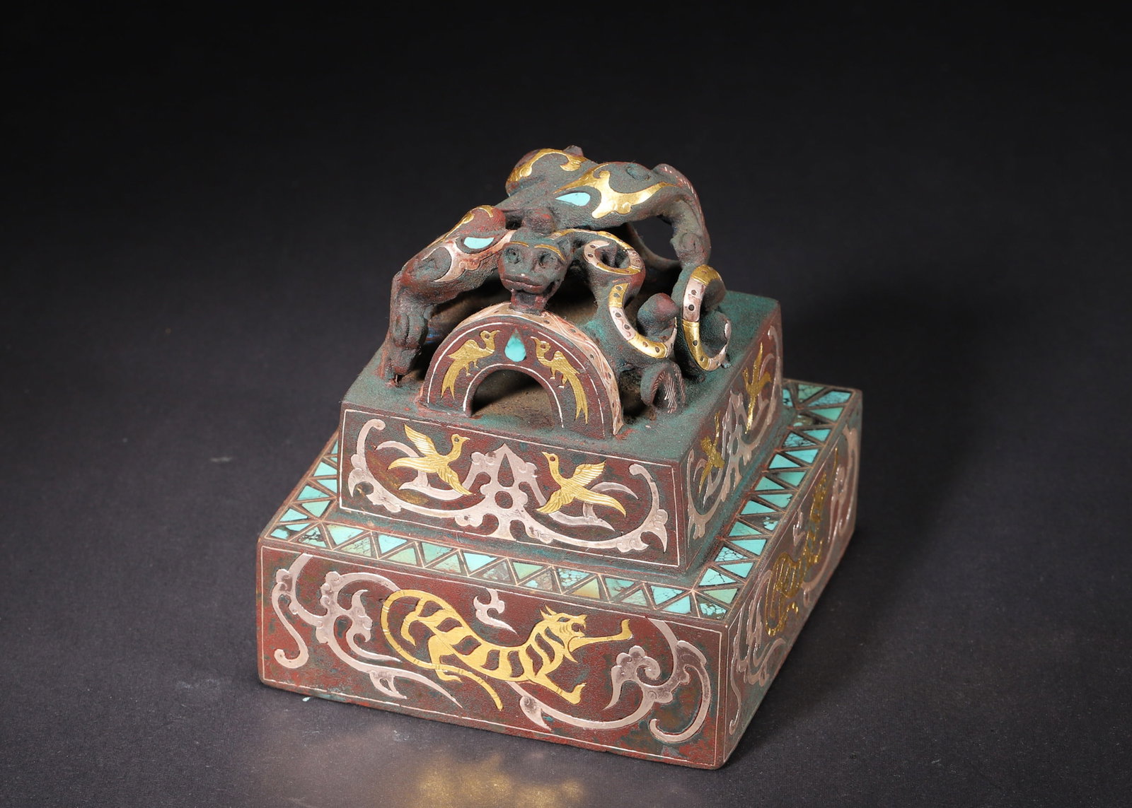 A Gold and Silver Inlaid Bronze Official Seal with Turquoise-Embedded Dragon Knob, Han Dynasty (1 of 10)