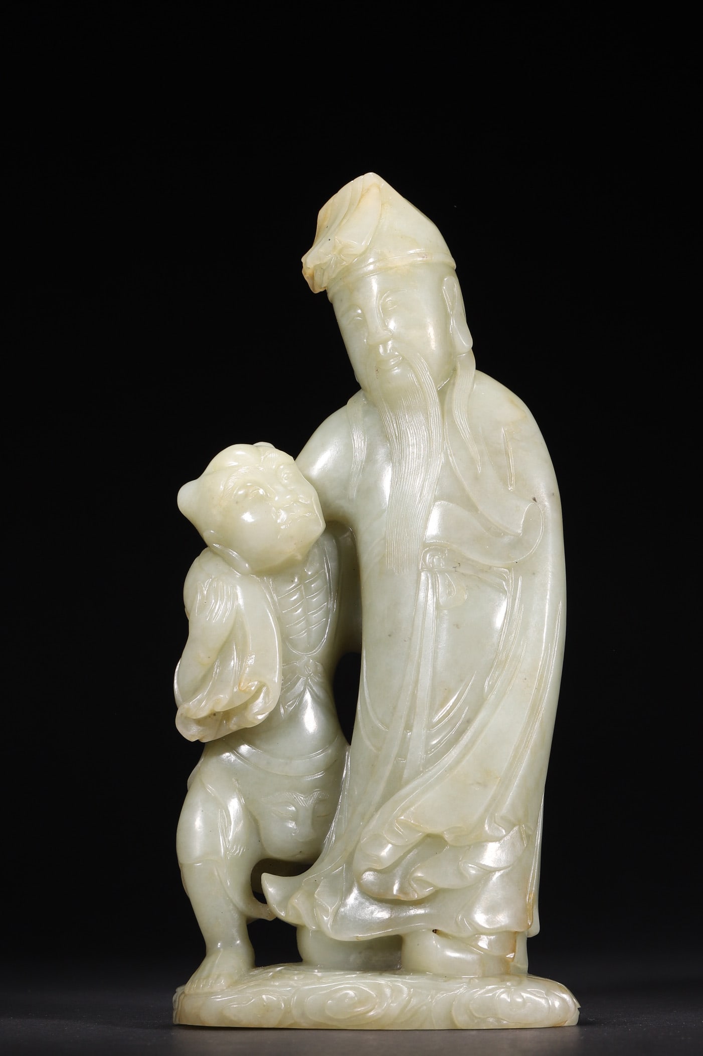 A - Hetian Greenish White Jade Drunken Wenchang Emperor Statue, Qing Dynasty: L 11cm (4.33 in); W 5.5cm (2.17 in); H 24cm (9.45 in); Wt 1565g (3.45 lb)Crafted from fine Hetian greenish white jade with aged natural patina, this Qing Dynasty carving presents Wenchang Emperor in a