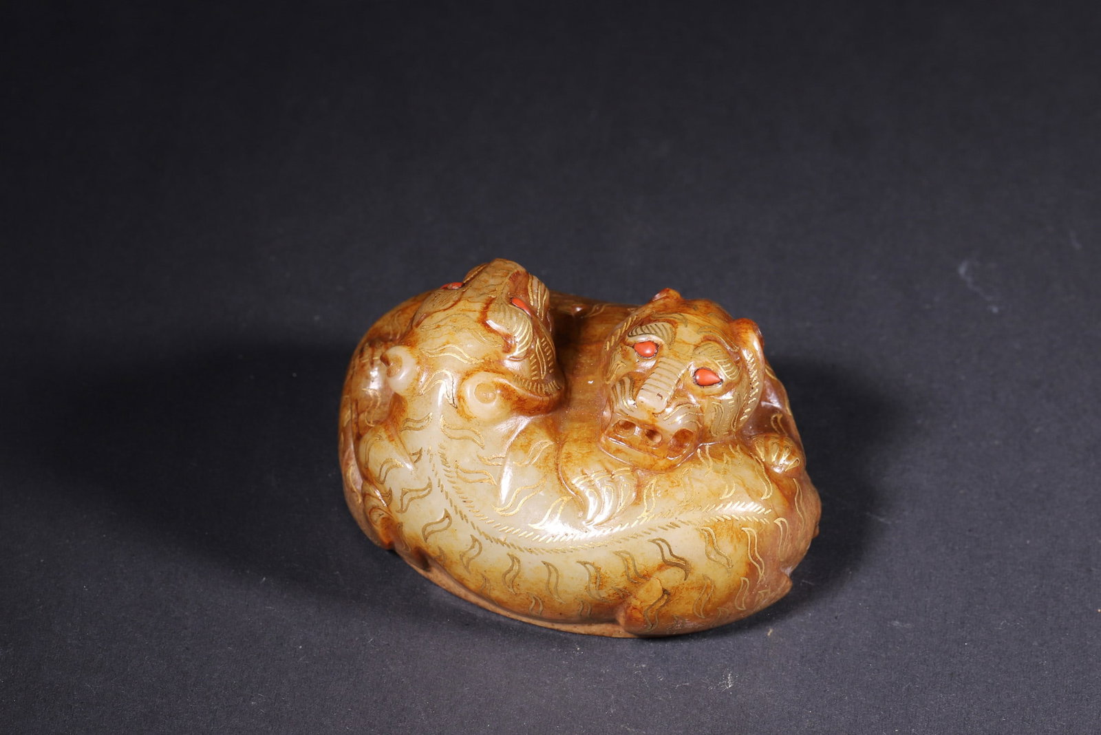 A Gold-Decorated and Gem-Embedded Jade Paperweight with Twin Beasts, Han Dynasty (1 of 8)