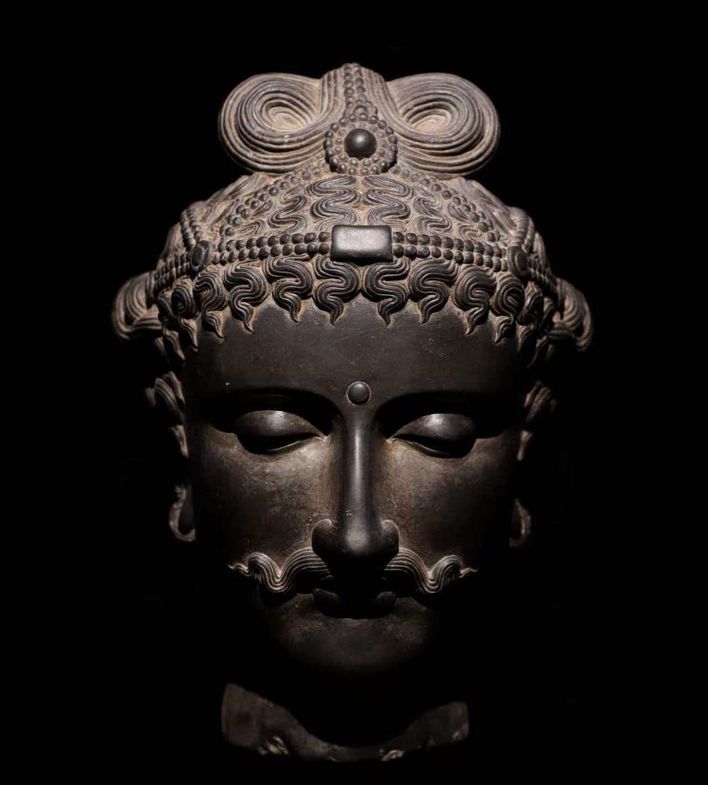 3 ANCIENT GANDHARA SCHIST BODHISATTVA HEADS FROM THE WORLD: Height:32cm(12.60in) Width:23cm(9.06in) Height with base:50cm(19.69in) Weight:20000g(44.09lb)Grey schist Bodhisattva head of Gandhara, dating to the 2nd?C3rd century Kushan period. Carved from a