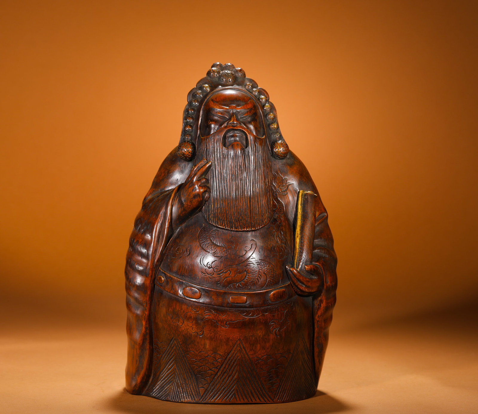 QING DYNASTY BAMBOO-CARVED PEN HOLDER OF LAOZI: Height:31cm(12.20in) Width:19cm(7.48in) Weight:1840g(4.06lb)Qing Dynasty hollowed bamboo brush pot carved as Laozi statue, each made from single natural bamboo stalk without splice. The Taoist sage is