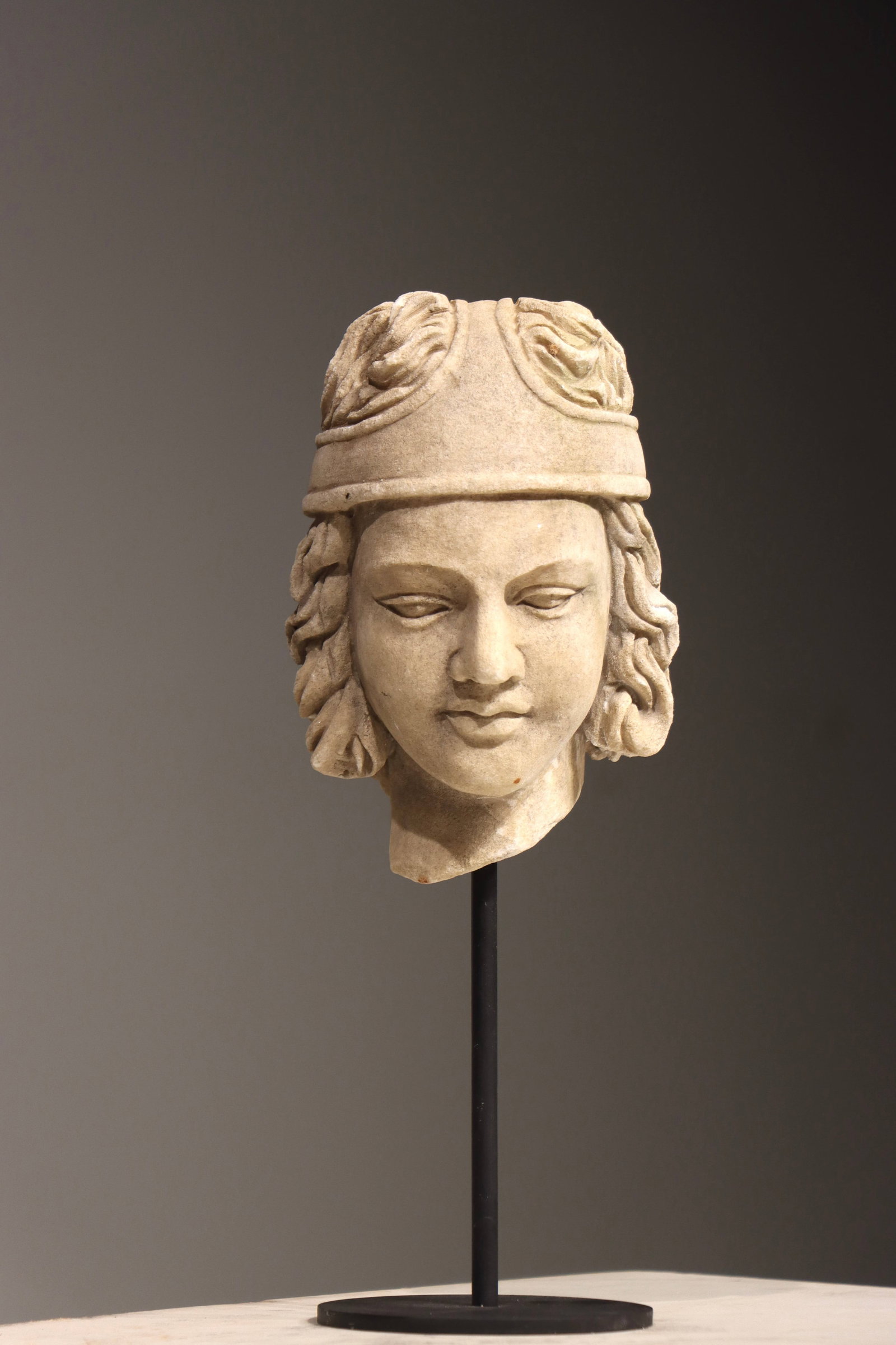 A 3-CENTURY ANCIENT GREEK STONE-CARVED HEAD: Total height 30 cm (11.81in), net height 18 cm (7.09in)