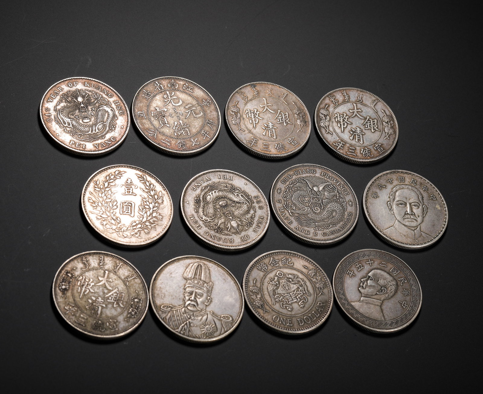A SET OF CHINESE SILVER DOLLARS (1 of 10)