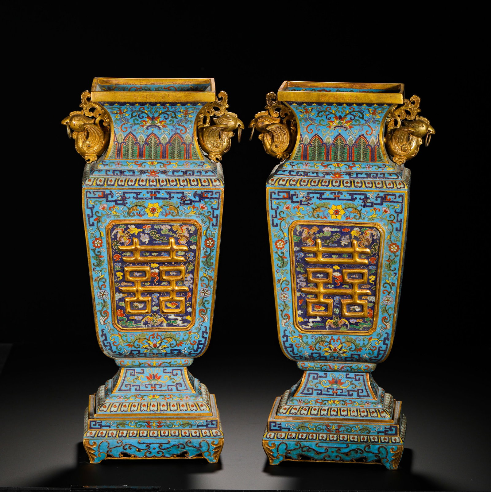 QING DYNASTY QIANLONG BRONZE CLOISONNE ENAMEL GILDED SQUARE VASE: Height:38.5cm(15.16in) Width:15cm(5.91in) Weight:6060g(13.36lb)Pair of Qianlong period cloisonne square wedding vases, gilt copper body with seven-character horizontal mark Da Qing Qian Long Nian Zhi 
