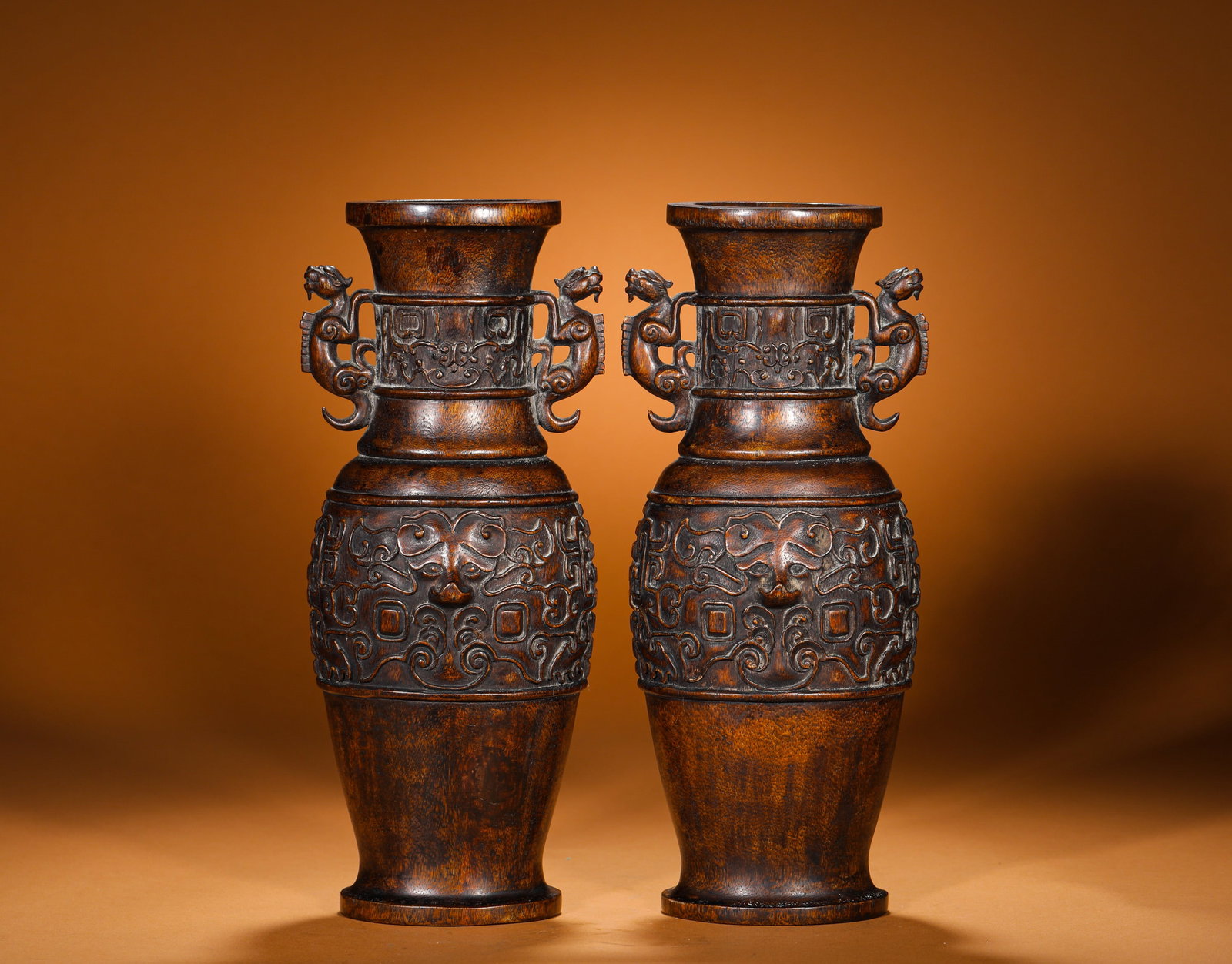 A QING DYNASTY AGARWOOD CARVED CHILONG EAR TAOTIE PATTERN APPRECIATION VASE (1 of 13)