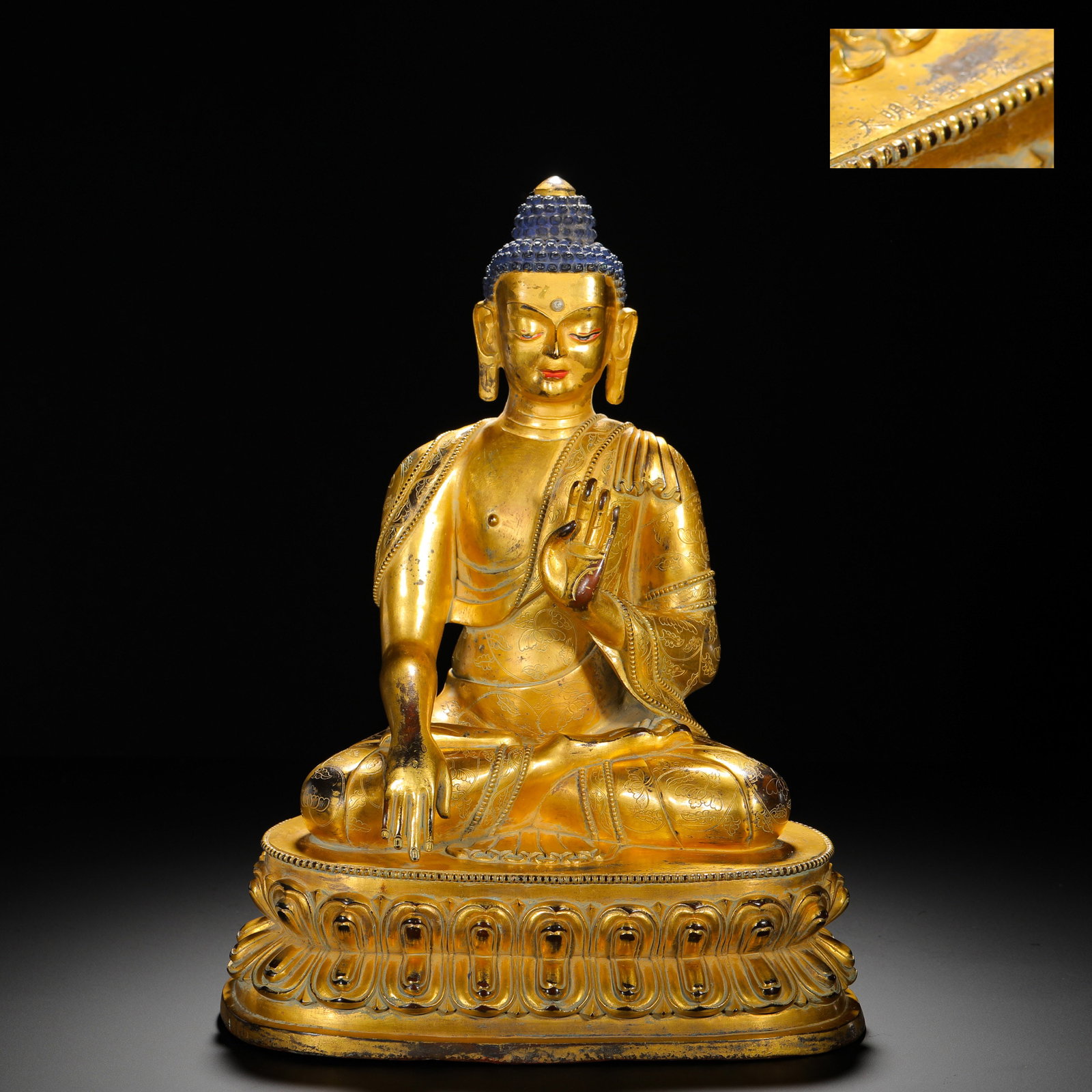 A GILDED BRONZE STATUE OF SAKYAMUNI PREACHING FROM THE QING DYNASTY: Height:37cm(14.57in) Width:25cm(9.84in) Weight:7880g(17.37lb)Fully gilded copper statue of preaching Shakyamuni Buddha, Qing Tibetan Buddhism. The Buddha sits in full lotus posture, spiral hair fully 