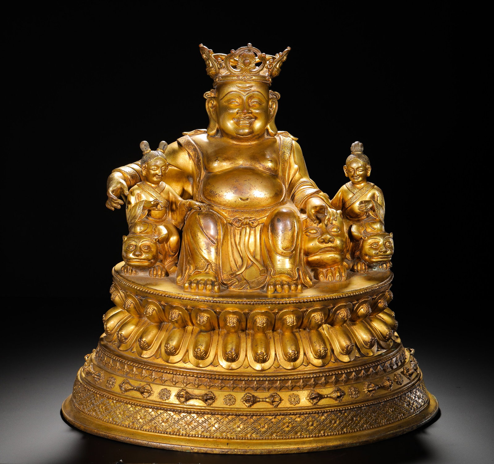 A GILDED BRONZE STATUE OF THE FIVE SONS OF MAITREYA FROM THE QING DYNASTY: Height:35cm(13.78in) Width:40cm(15.75in) Weight:15000g(33.07lb)Fully gilded copper statue of five-sons Maitreya, Qing Dynasty. Maitreya wears jeweled crown with plump bare belly and joyful relaxed smi
