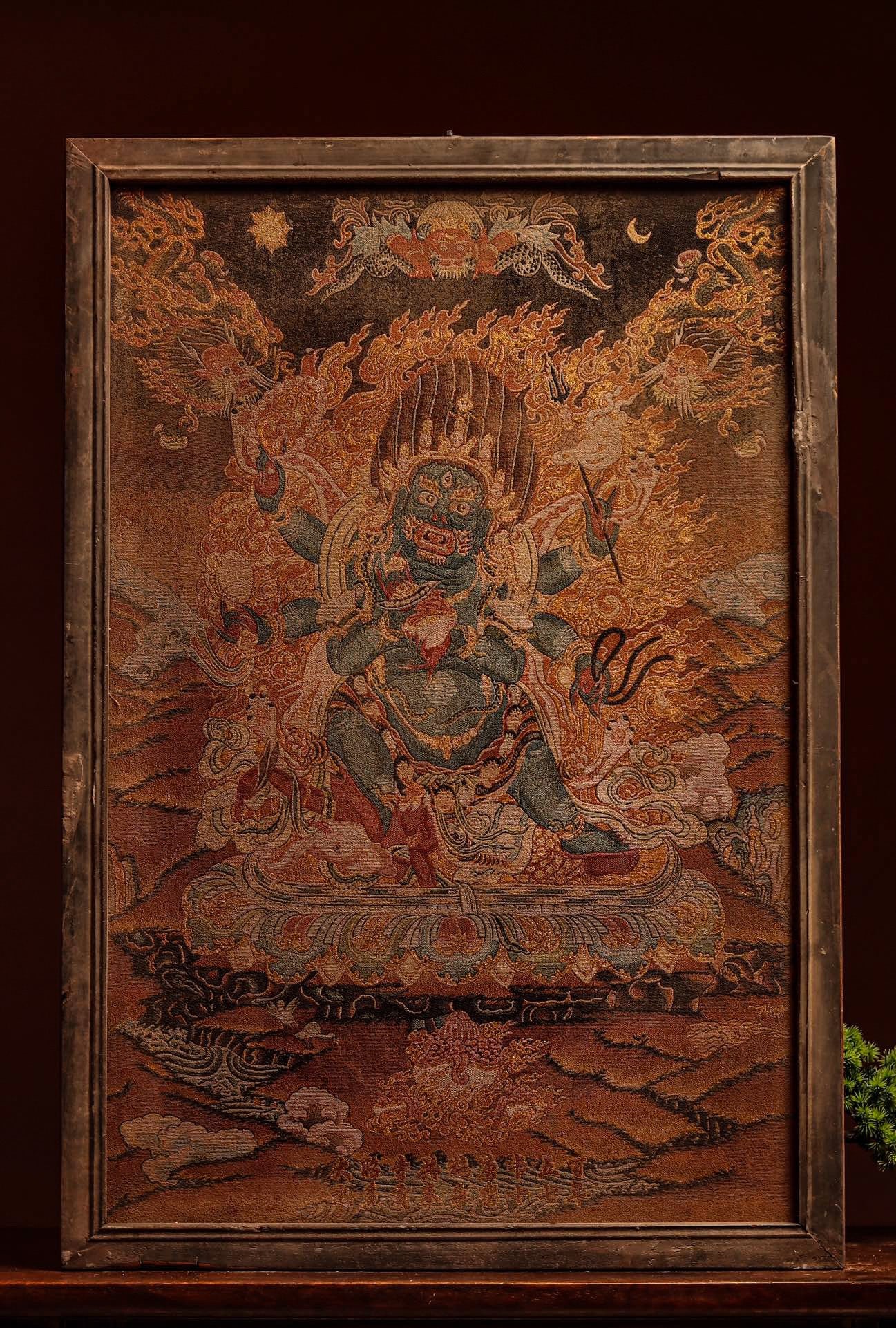 EMBROIDERED PROTECTOR THANGKA OF THE QING DYNASTY: Height:96cm(37.80in) Long:66cm(25.98in)Tibetan embroidered Dharma protector thangka. Six-armed Mahakala wrathful deity, flame halo, mountain lotus base. Full gold thread embroidery, wooden framed Tibe
