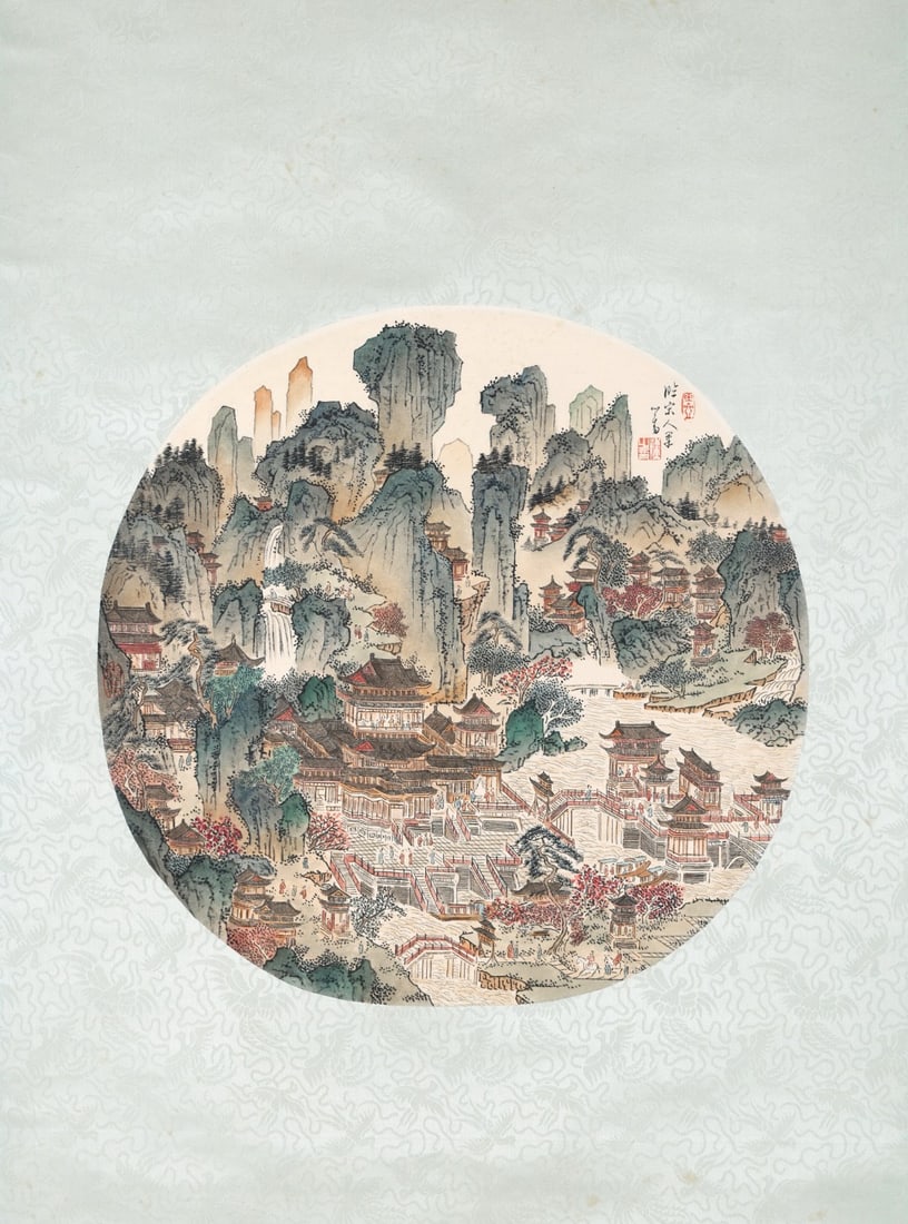 PU RU, IMMORTAL MOUNTAINS AND PAVILIONS AFTER SONG MASTER, COLOUR CIRCULAR FAN PAINTING, HANGING: Image L 45cm (17.72 in) x Image W 45cm (17.72 in),Circular colour painting on paper, copying Song architectural landscape painting. Towering jagged peaks, cascading waterfalls, layered palaces built b