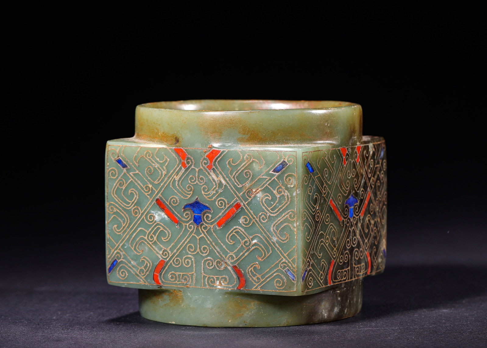 HETIAN GREEN JADE CONG WITH GOLD INLAY AND GEMSTONE INLAYS, HAN DYNASTY (202 BC?C220 AD): H 8cm (3.15 in); W 8.5cm (3.35 in); Wt 484g (1.07 lb),Classic outer-square inner-round cong carved from Hetian green jade with cylindrical collars at both ends. Symmetrical interlocking cloud scrolls 