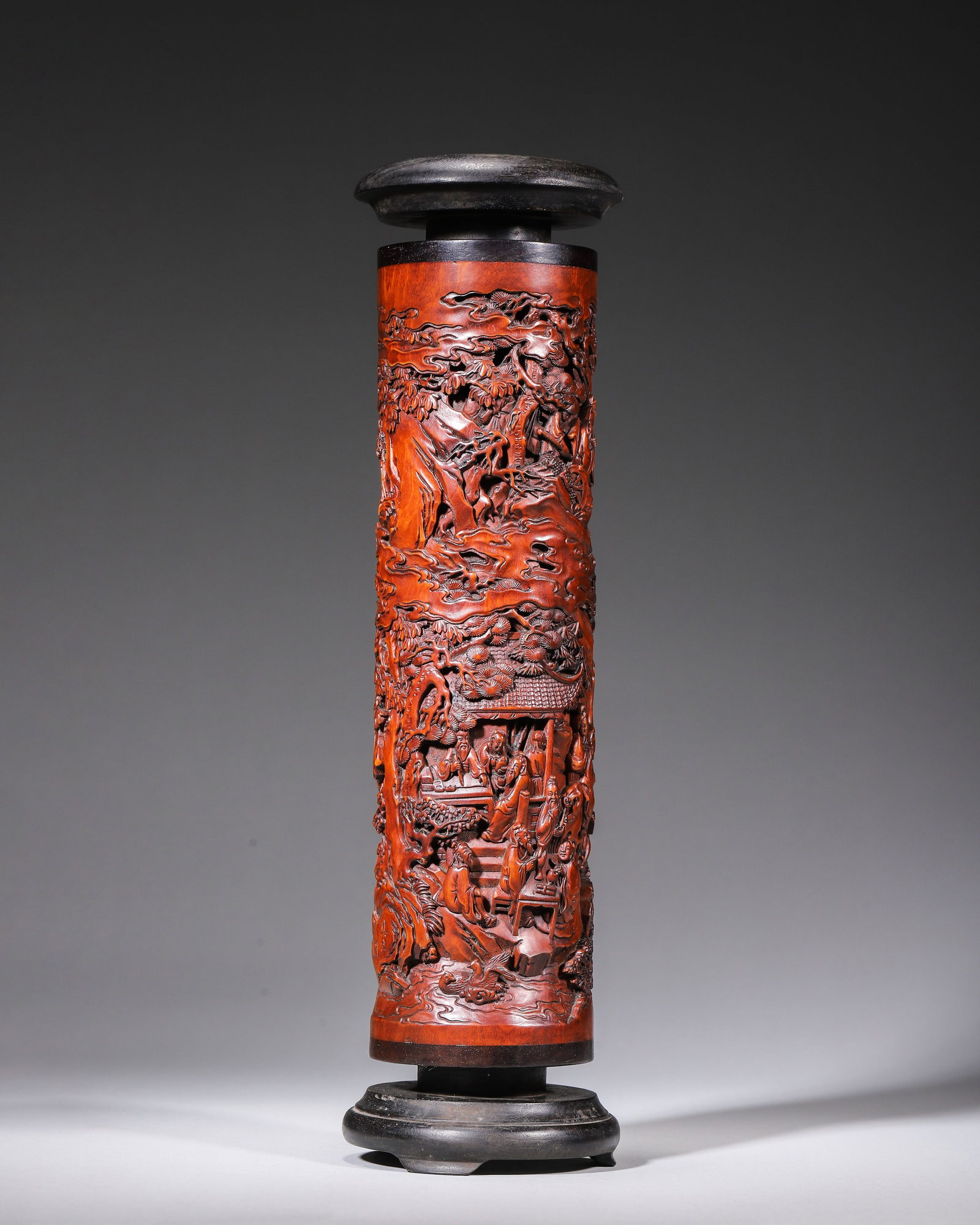 QING DYNASTY BOXWOOD OPENWORK INCENSE TUBE CARVED WITH LITERATI GATHERING LANDSCAPE, SIGNED QI JI: H 32.00cm (12.60 in); D 8.50cm (3.35 in); Wt 548.00g (1.21 lb),Turned from single boxwood trunk with warm honey-toned patina, fitted with rosewood cover and stand. Multi-layer openwork landscape carve