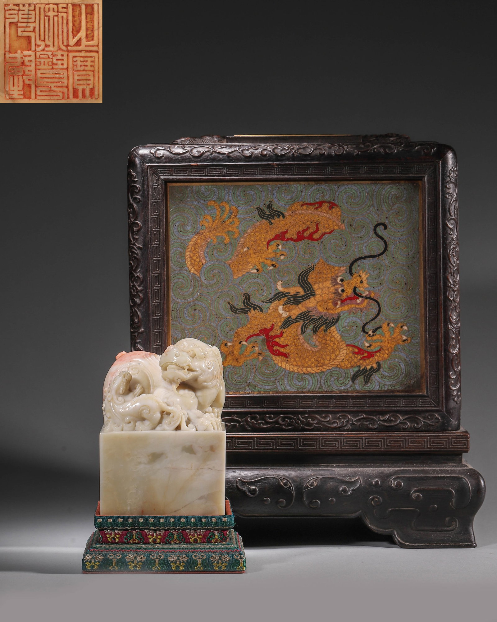 SHOUSHAN FURONG STONE IMPERIAL SEAL, QIANLONG YULAN ZHI BAO, LION AND CUB KNOB, QIANLONG PERIOD,: Wt 1374g (3.029 lb); L 8cm (3.15 in); W 8cm (3.15 in); H 11cm (4.33 in),Carved from Shoushan Furong stone with natural pink veining on creamy white ground, formed as square imperial seal. The knob is 