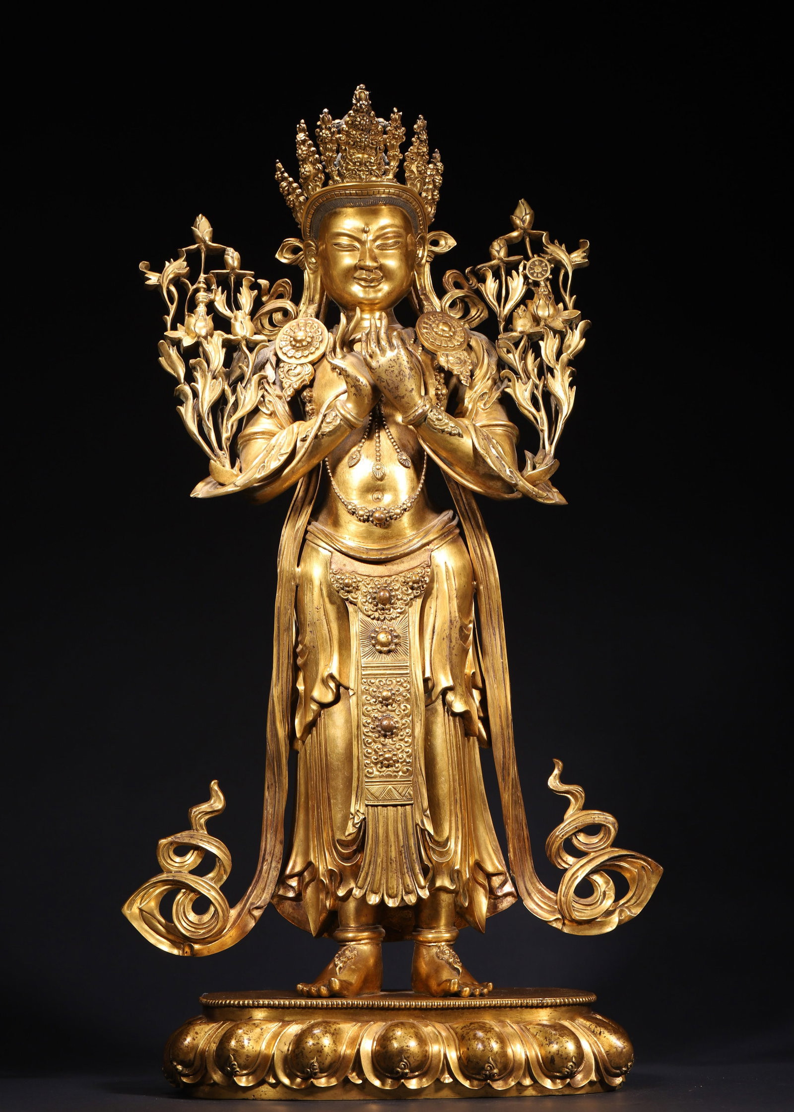GILT BRONZE MAITREYA BODHISATTVA STANDING FIGURE, QING DYNASTY (1644-1912 AD): L 32cm (12.60 in); W 14cm (5.51 in); H 60cm (23.62 in); Wt 9803g (21.61 lb),Cast copper fully gilded. The bodhisattva wears an ornate crown with gentle smiling visage, hands forming vitarka mudra at c