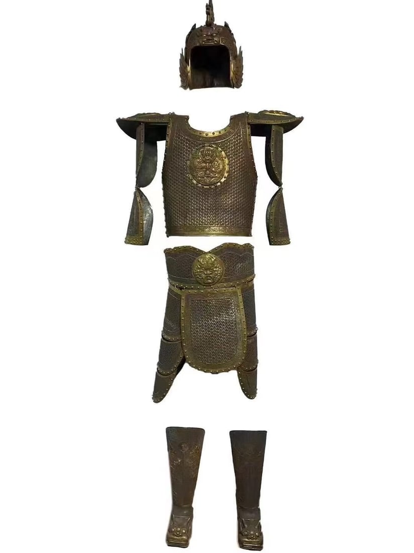 GILT BRONZE GENERAL'S FULL SUIT OF ARMOUR, QING DYNASTY ((1636?C1912): Wt approx. 75000g (165.35 lb); H 220cm (86.61 in),Full set of gilt bronze armour consisting of phoenix-wing helmet, pauldrons, breastplate, arm guards, skirt armour and beast-head boots. Hammered text