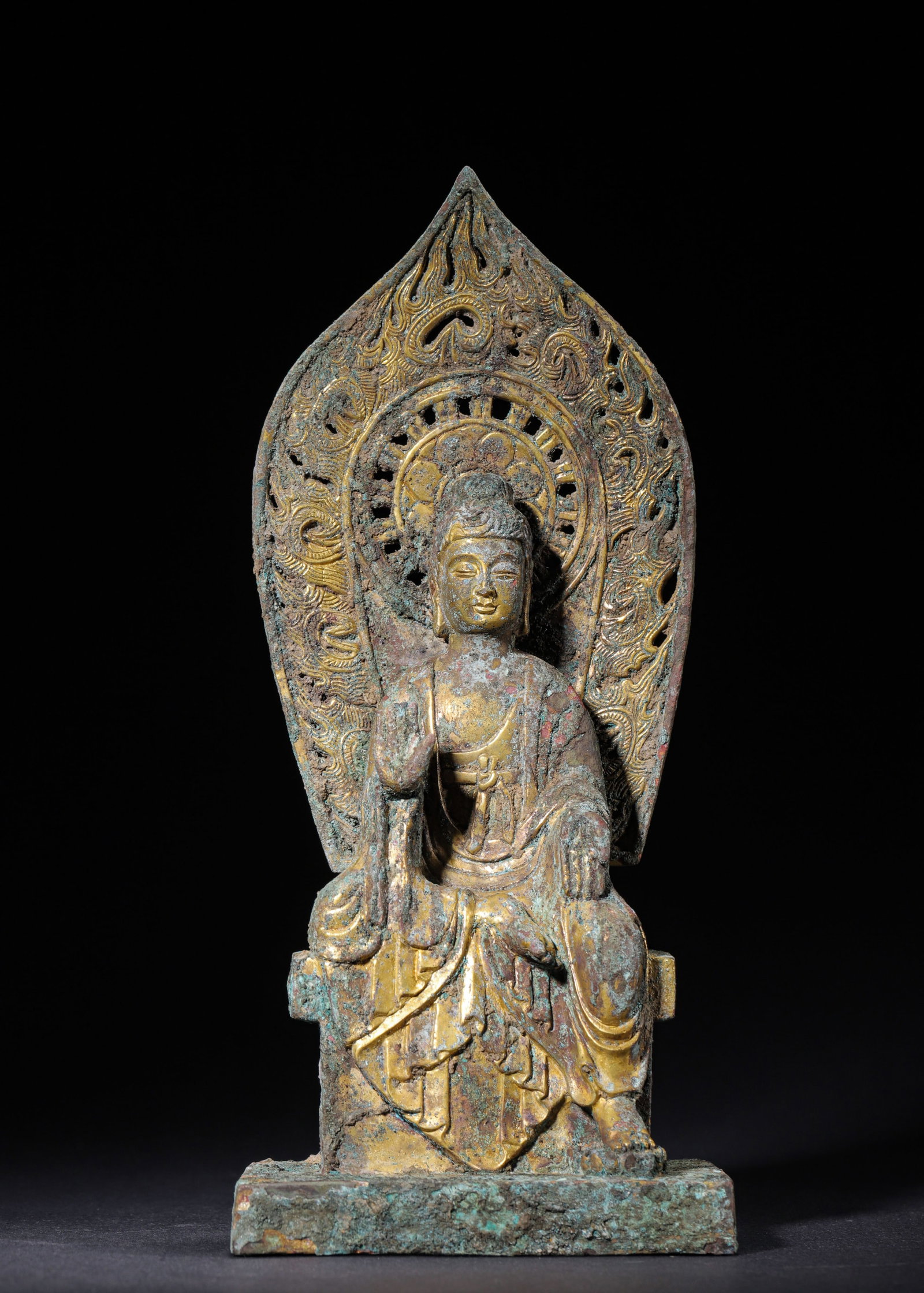 GILT BRONZE CROSS-LEGGED MAITREYA BUDDHA, WEI-JIN PERIOD (220-420 AD): H 26cm (10.24 in); L 11cm (4.33 in); W 9cm (3.54 in); Wt 1322g (2.91 lb),Cast bronze with gilded surface. The Buddha features neat ushnisha and serene facial features, seated in cross-legged posture. 