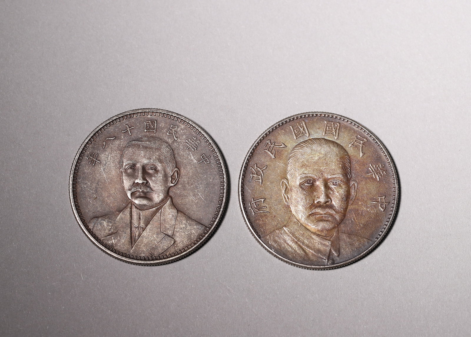 A GROUP OF TWO REPUBLICAN SILVER COINS: SUN YAT-SEN 18TH YEAR SUIT BUST ONE DOLLAR & NATIONAL: D 4cm (1.57 in); Wt 55g (0.12 lb),A set of two rare Sun Yat-sen portrait silver coins of the Republic of China. One features Sun Yat-sen in western suit dated the 18th Year of the Republic of China, w