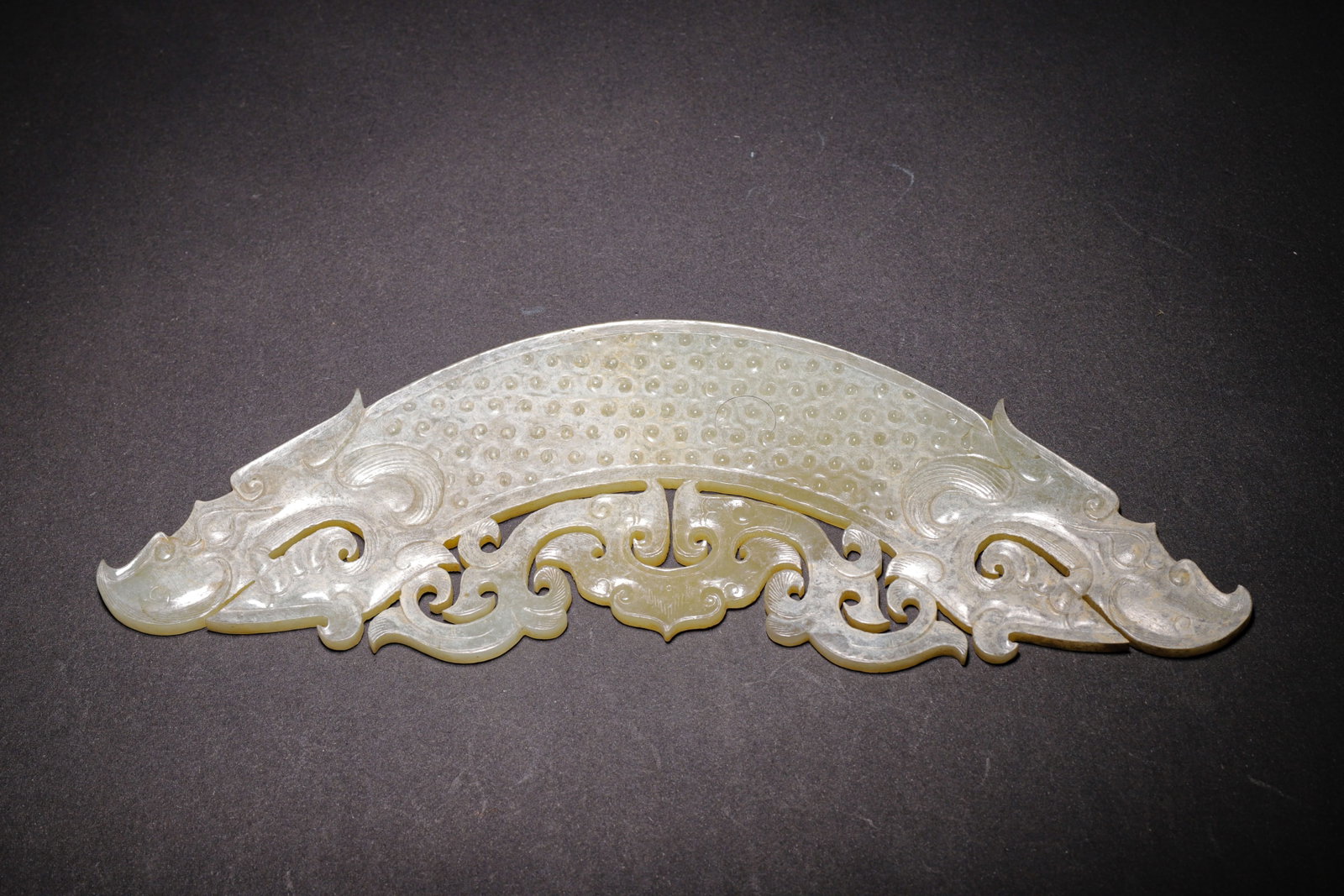 WHITE JADE OPENWORK HUANG WITH TWIN DRAGONS AND GRANULE PATTERN, HAN DYNASTY (202 BC-220 AD) (1 of 7)