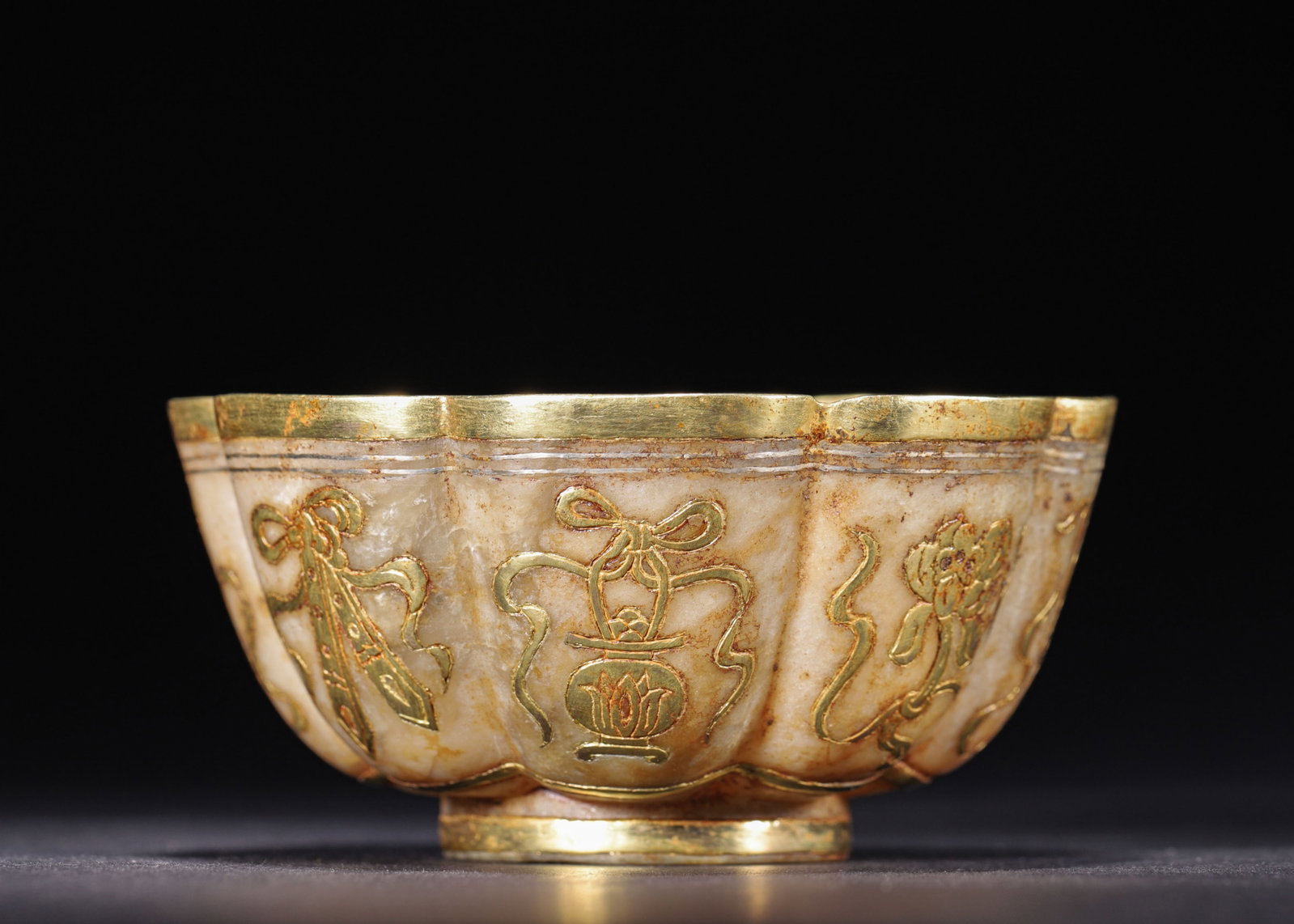 GILT-BRONZE CLAD HETIAN JADE LOBED BOWL WITH EIGHT AUSPICIOUS SYMBOLS, TANG DYNASTY (618?C907 AD) (1 of 10)