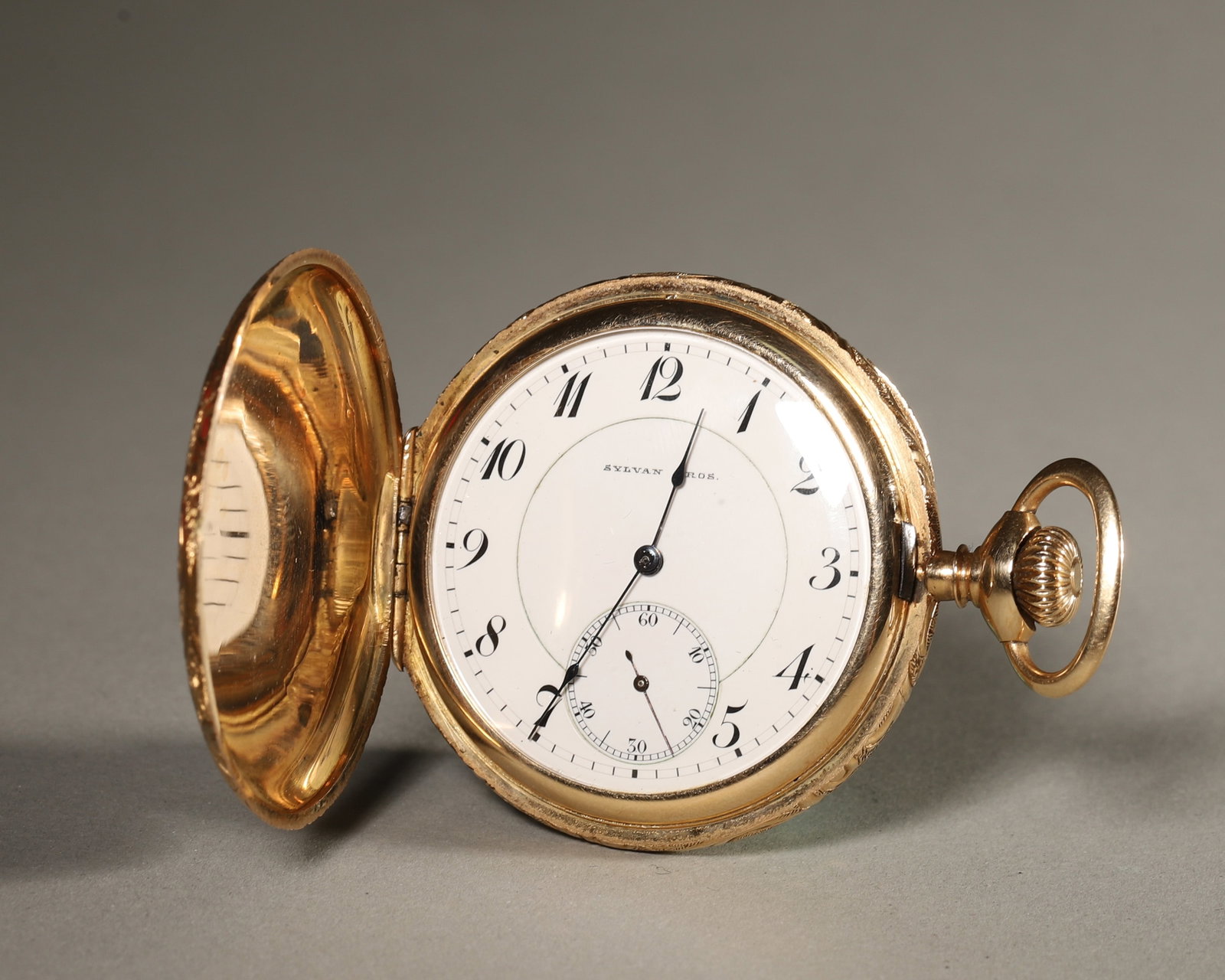 14K GOLD FULL ENGRAVED HUNTER-CASE AGASSIZ 21 JEWELS ADJUSTED EXTRA POCKET WATCH, CIRCA 1900?C1920: Wt 77g (0.17 lb); D 4.5cm (1.77 in),Swiss AGASSIZ hunter pocket watch in 14K solid gold case, fully hand-engraved scrollwork with monogram shield. White enamel dial with Arabic numerals and subsidiary