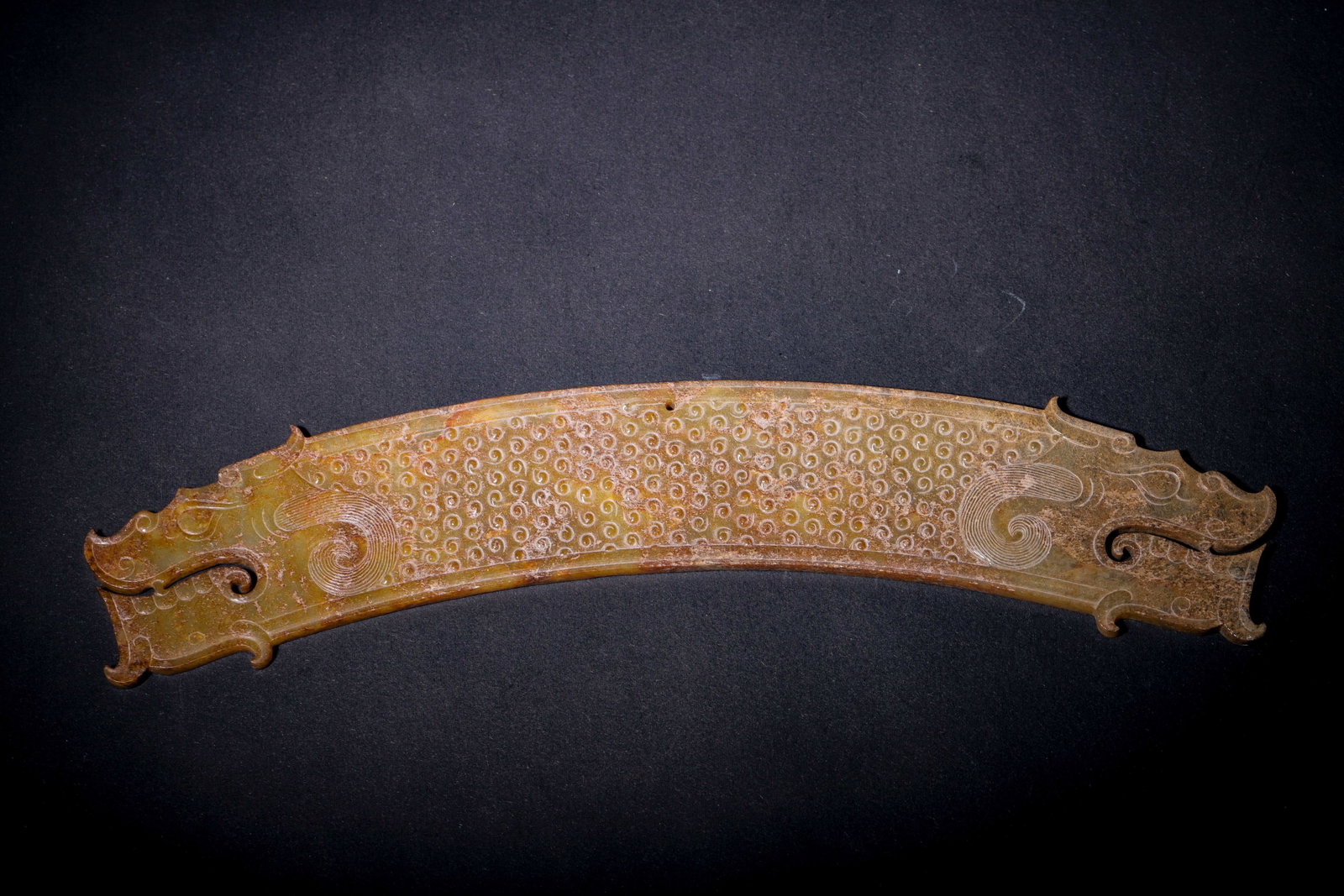 YELLOW JADE TWIN-DRAGON-HEADED HUANG WITH GRANULE PATTERN, WARRING STATES PERIOD (475 BC-221 BC)