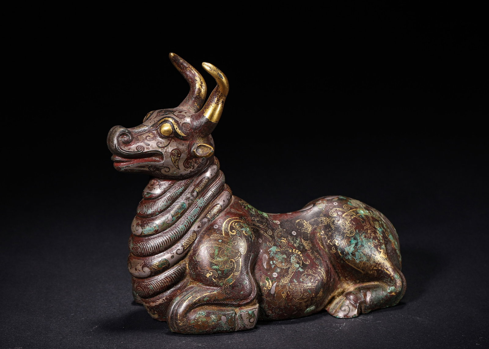 BRONZE RECUMBENT OX WEIGHT INLAID WITH GOLD AND SILVER, WARRING STATES PERIOD (475?C221 BC) (1 of 9)