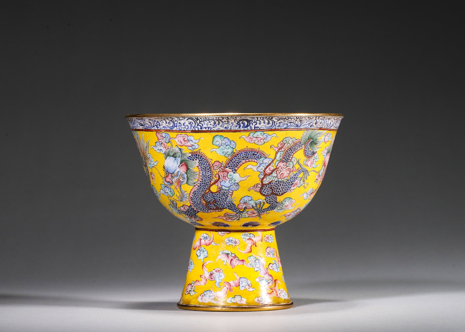 COPPER-BODY PAINTED ENAMEL YELLOW-GROUND STEM CUP WITH DRAGON AMID CLOUDS, QIANLONG PERIOD, QING (1 of 8)