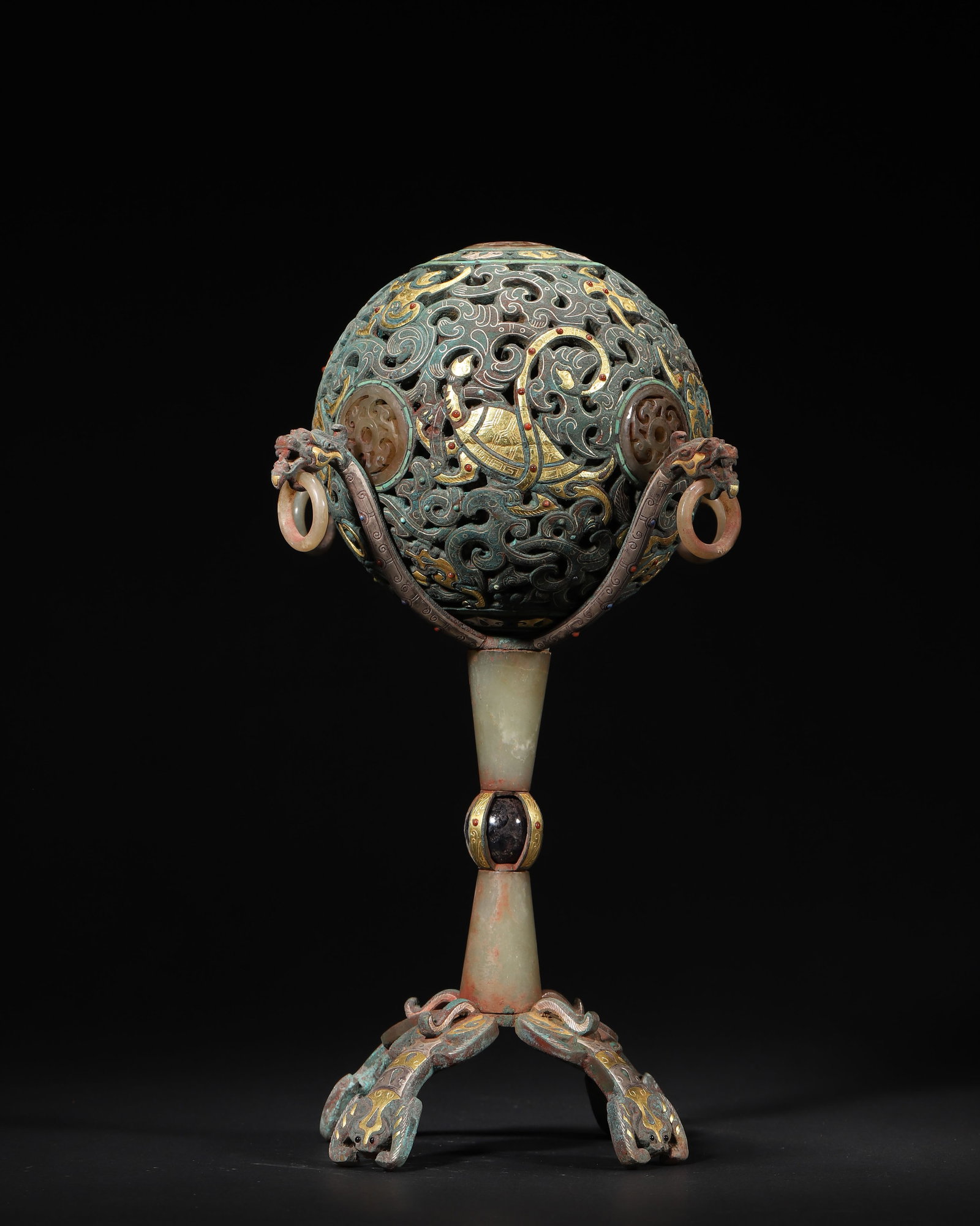 Han Dynasty Bronze Censer With Inlaid Gold, Silver, Gemstones And Jade, Supported By Tripod With: 5.51in x 5.51in x 11.42in (14.0cm x 14.0cm x 29.0cm), 3.772lb (1711.0g)A Han Dynasty bronze censer with openwork sphere, inlaid with gold, silver, turquoise and agate, and mounted with jade rings. Sup