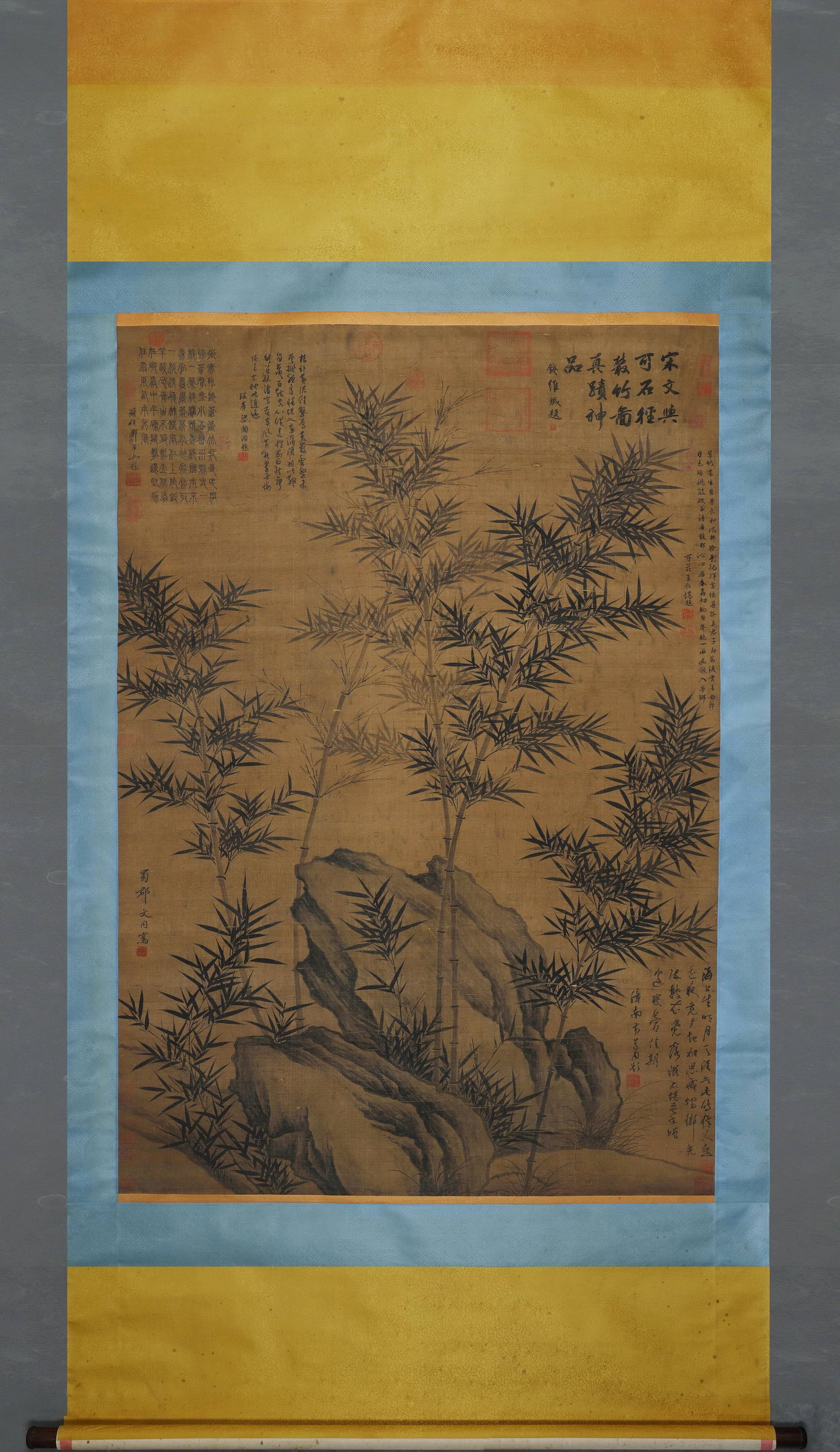 Hanging Scroll Of Ink Bamboo By Wen Tong, Northern Song (960 1127): Image L 151cm (59.45 in) Image W 105cm (41.34 in)Silk hanging scroll of ink bamboo and rocks. Surrounded by historic inscriptions and collector seals. Original tri colour silk mounting, solid brushwor