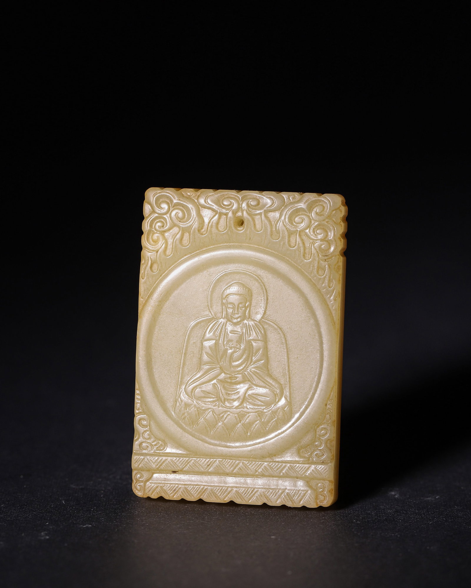 Hetian Jade Zigang Plaque With Buddha And Inscription, Qing Dynasty: Wt 60g (0.132 lb); L 5.6cm (2.205 in); W 3.6cm (1.417 in)Rectangular Hetian jade plaque with natural inclusions. Obverse carved seated Buddha within round cartouche. Reverse bears inscribed poetry wit