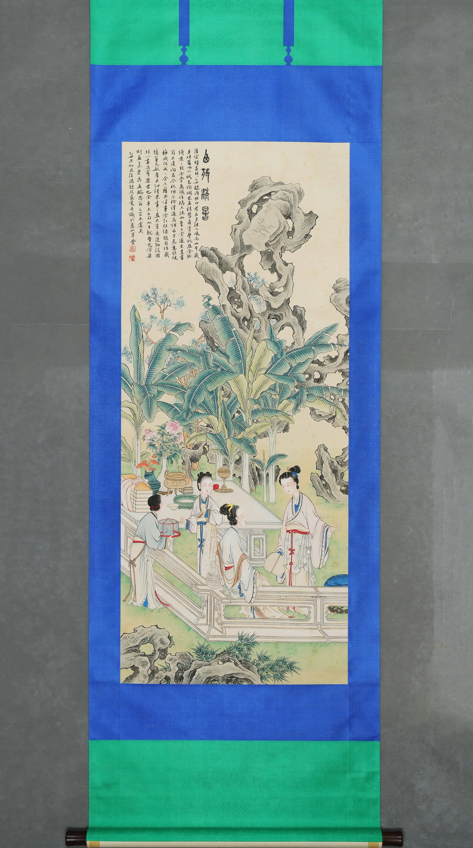 Feng Chaoran (1882 1954), Mid Summer Leisure, Hanging Scroll: Image L 130cm (51.18 in) x Image W 55cm (21.65 in)Dated Yichou year, ink and colour on paper. Depicts ladies gathering for summer leisure in courtyard, with scholar??s rocks, plantains, ritual vessels