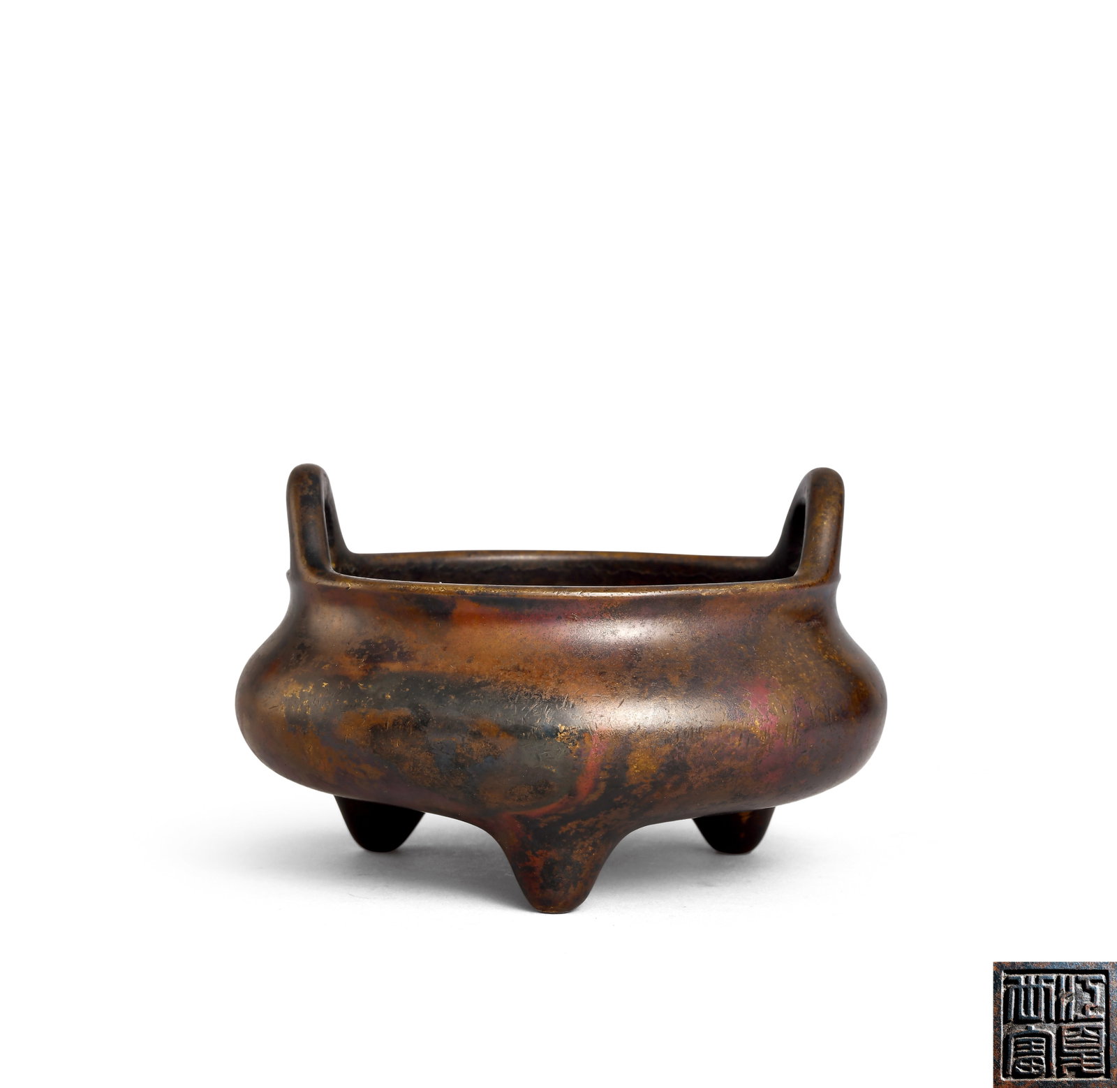 Bronze Tripod Censer, Early Qing Dynasty (1644 1735): D 11.5cm (4.53 in); H 8.5cm (3.35 in)Bronze tripod censer with two upright handles. Rounded bulbous body on three feet. Four character seal mark on base. Mottled heavy aged patina, for hall incense di