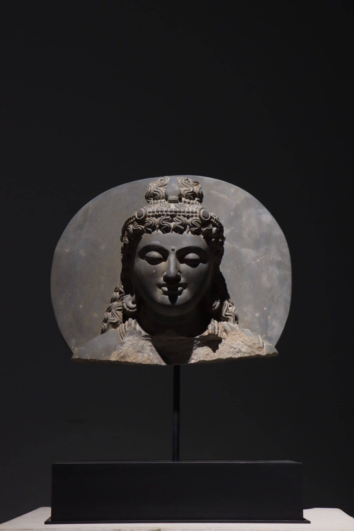 A Grey Schist Buddha Bust With Mandorla, Gandhara, 2Nd 3Rd Century Ad (1 of 8)