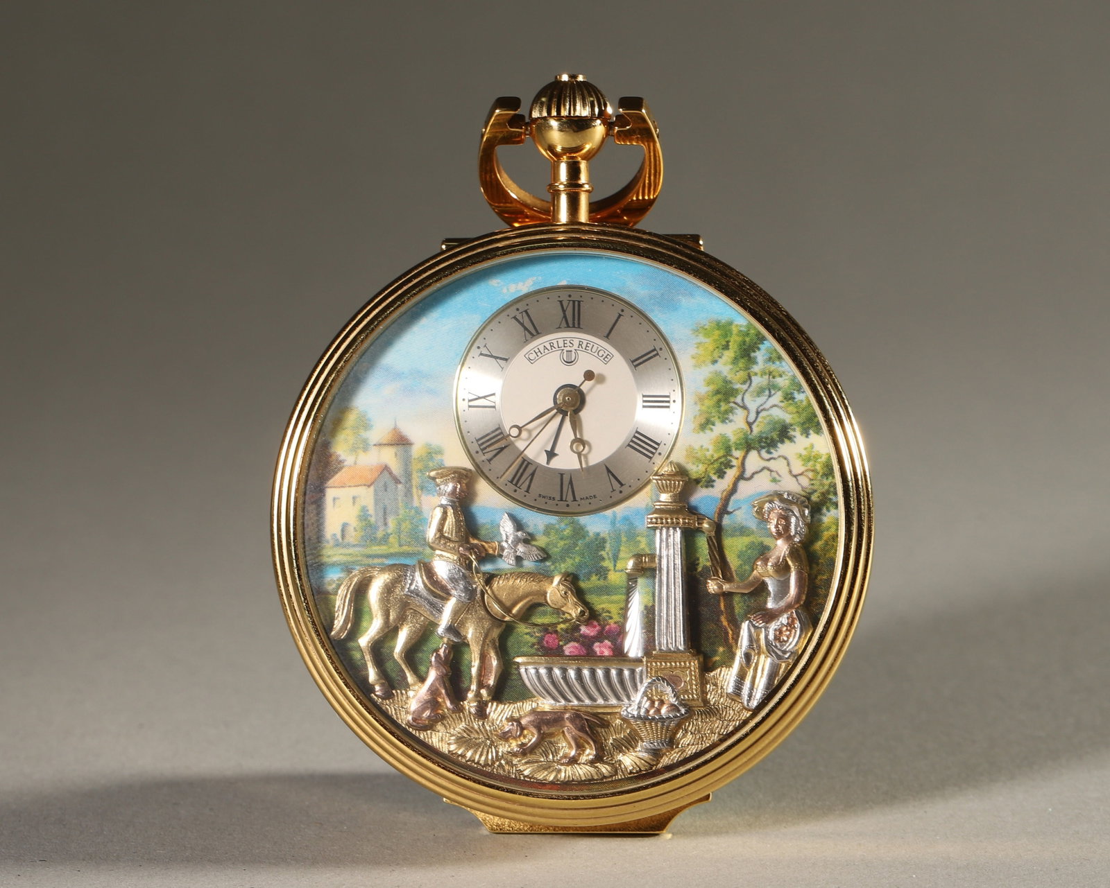 Charles Reuge Gold-Plated Automaton Musical Pocket Watch, Pastoral Scene(In Good Running Order): An iconic Charles Reuge automaton musical pocket watch, gold-plated, with a hand-painted pastoral scene. Features a Swiss musical movement, a masterpiece of Reuge's horological art for collectors.D5.7