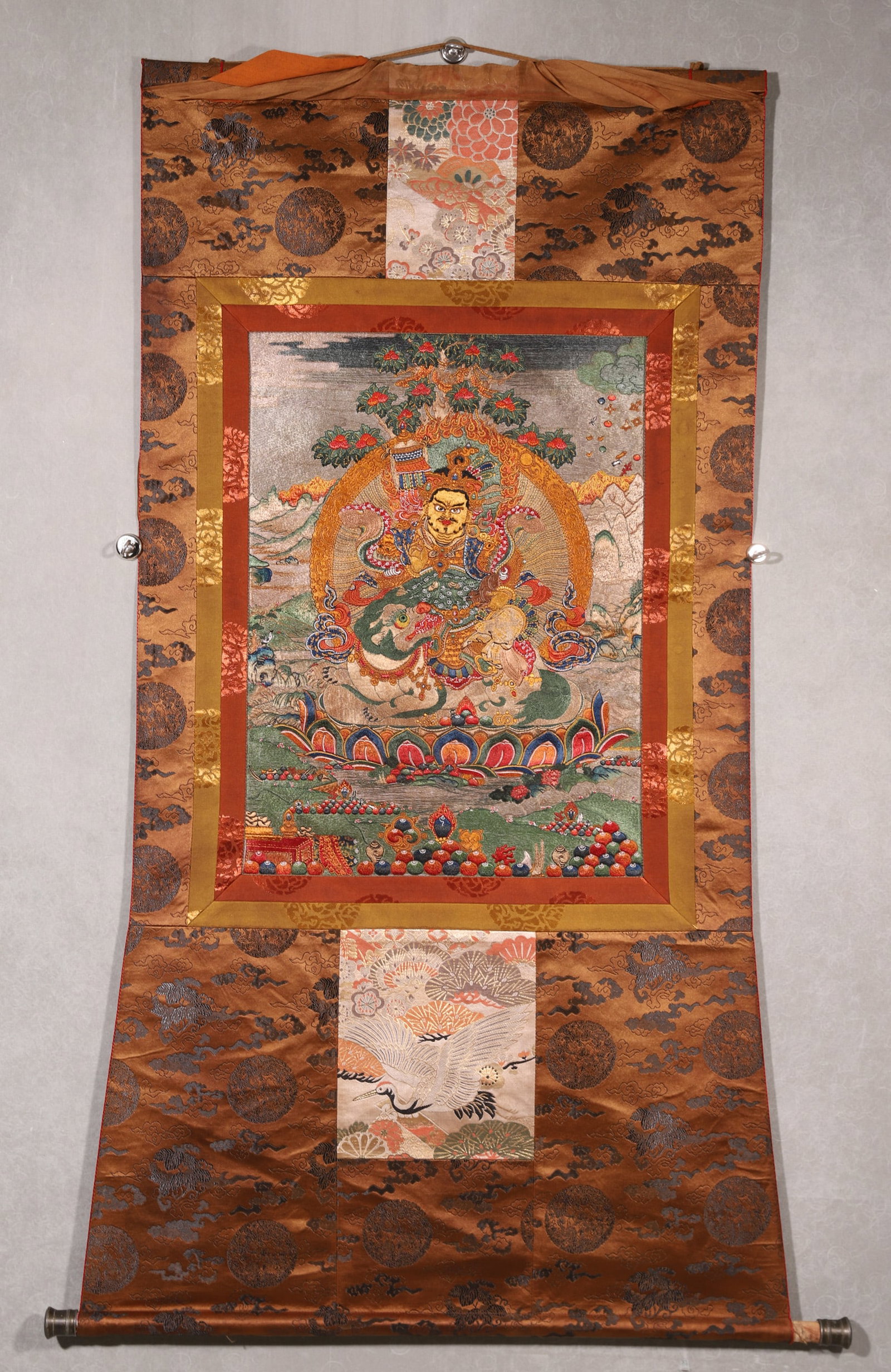 An Embroidered Thangka Of Dragon-Riding Yellow Jambhala, Qing Dynasty (1 of 8)