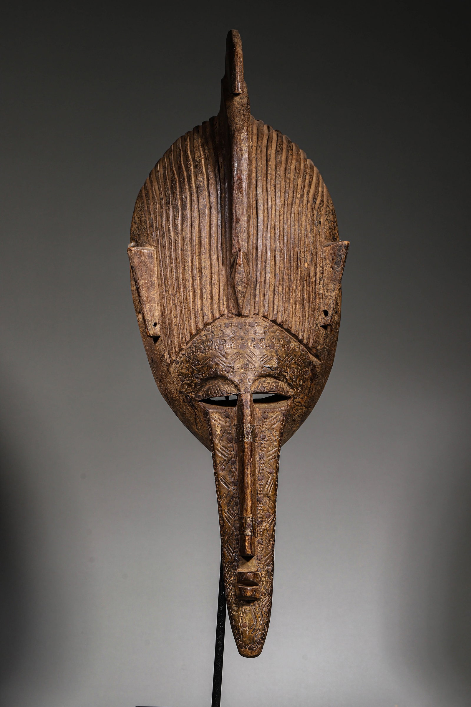 A West African Long-Nosed Carved Wood Mask (1 of 9)