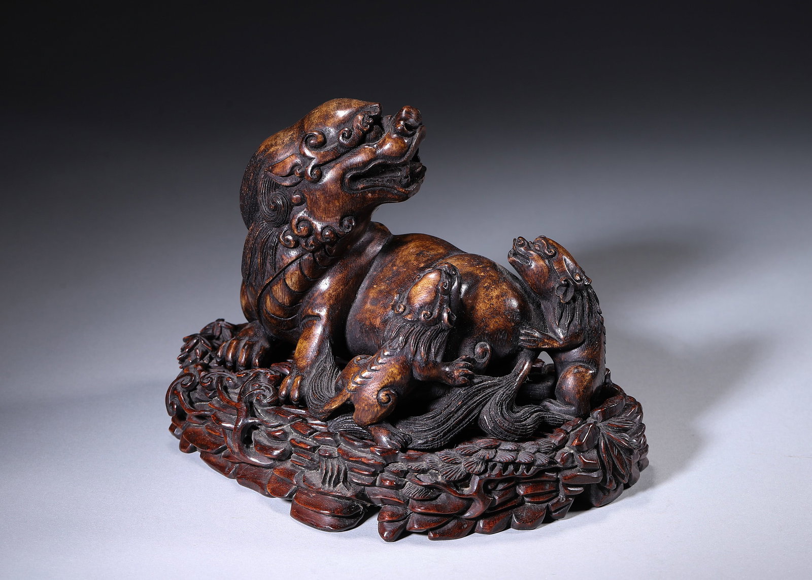 Qing Dynasty,Chenxiang Carved Ornament Of Grand Lion And Young Cubs With Hardwood Stand (1 of 8)