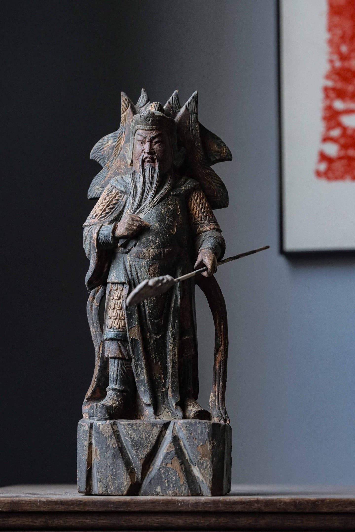 Song Dynasty woodcarving of Guan Gong (Guan Er Ye): Height:37cm(14.57in)Width:14cm(5.51in)Thickness:9cm(3.54in)Wood sculpture with polychrome pigments. Guan Gong stands upright, wearing a warrior crown, with a dignified face and long beard hanging on h