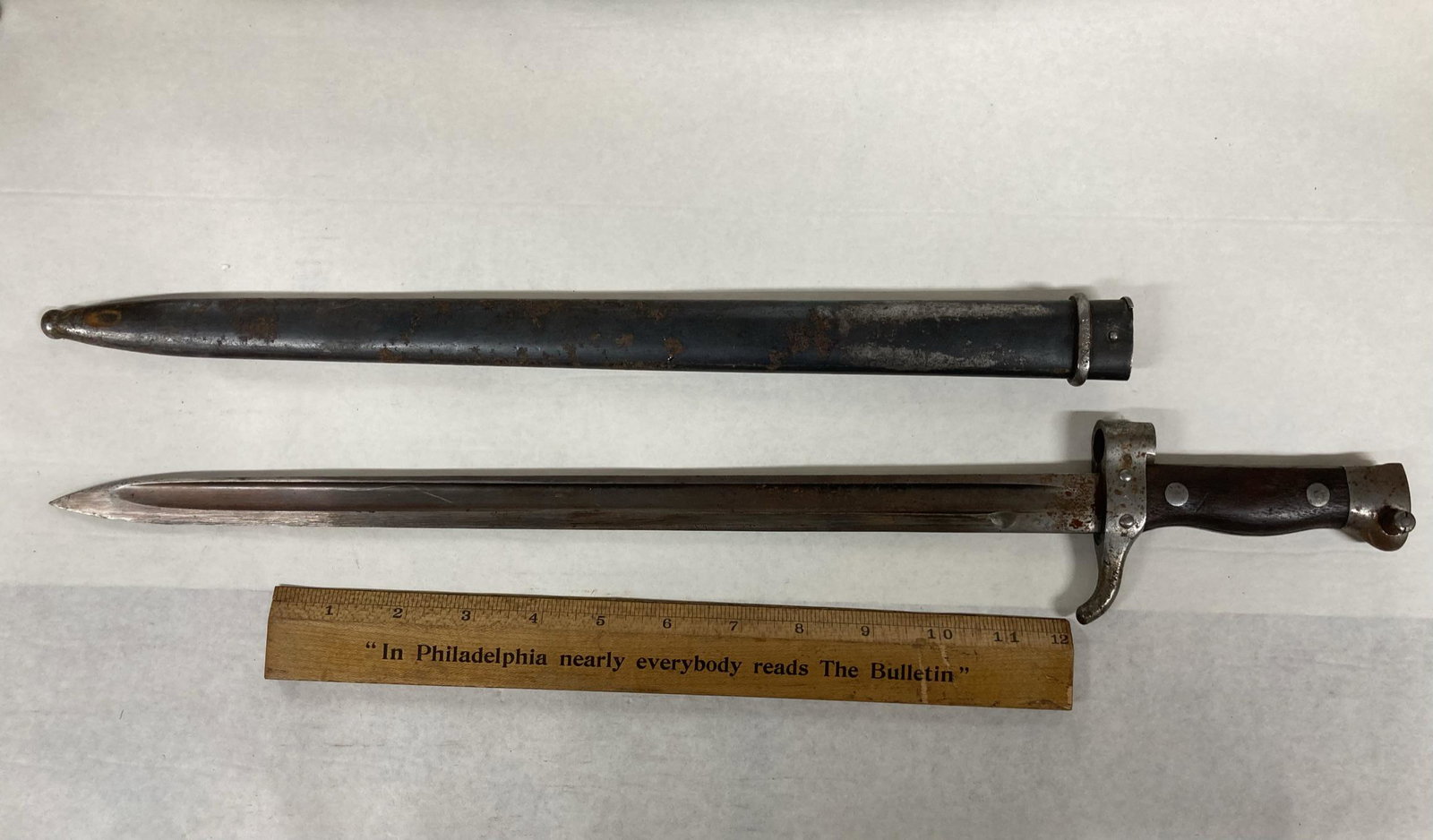 Bayonet with metal and wooden handle: Bayonet with metal and wooden handle