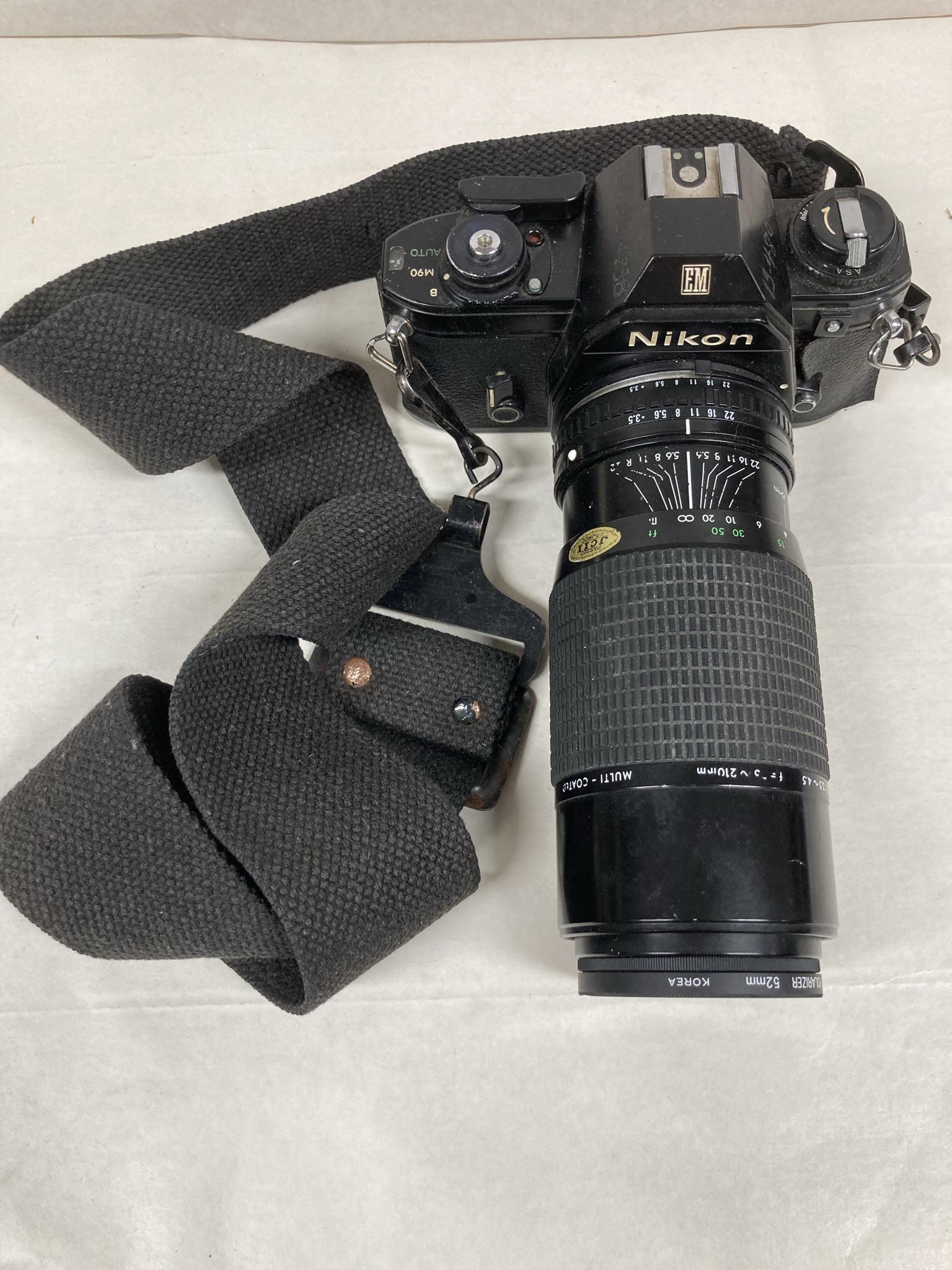 Nikon Camera with Lens Promaster Spectrum 7: Nikon Camera with Lens Promaster Spectrum 7