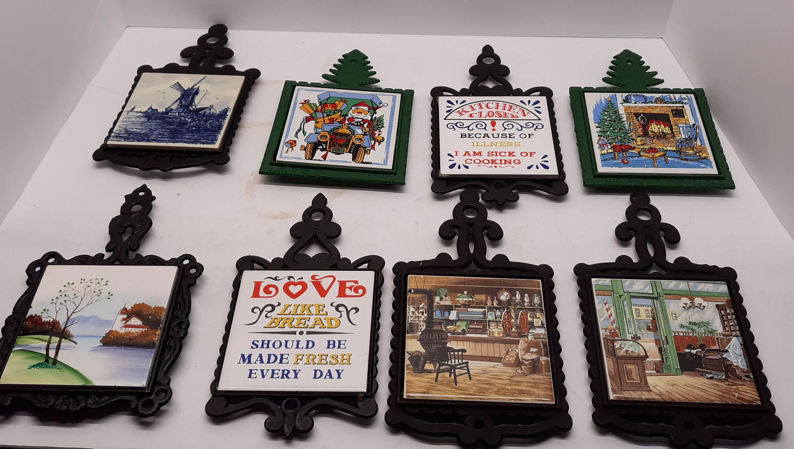 Eight Metal and Tile Trivets: 8 Metal and tile trivets