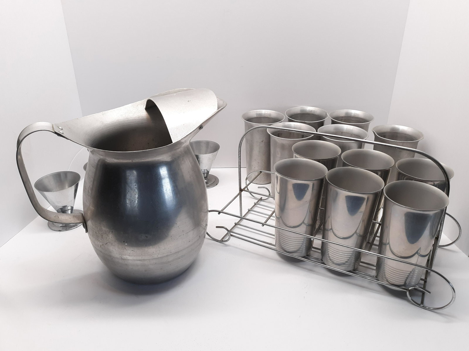 Vintage Metal Barware: Vintage Metal Barware, 2 tumblers not pictured. Set with carrier has 8 tumblers.