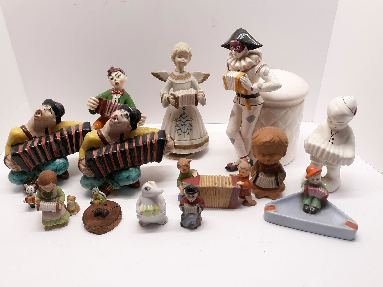 Fourteen Accordion Playing Figurines (1 of 6)