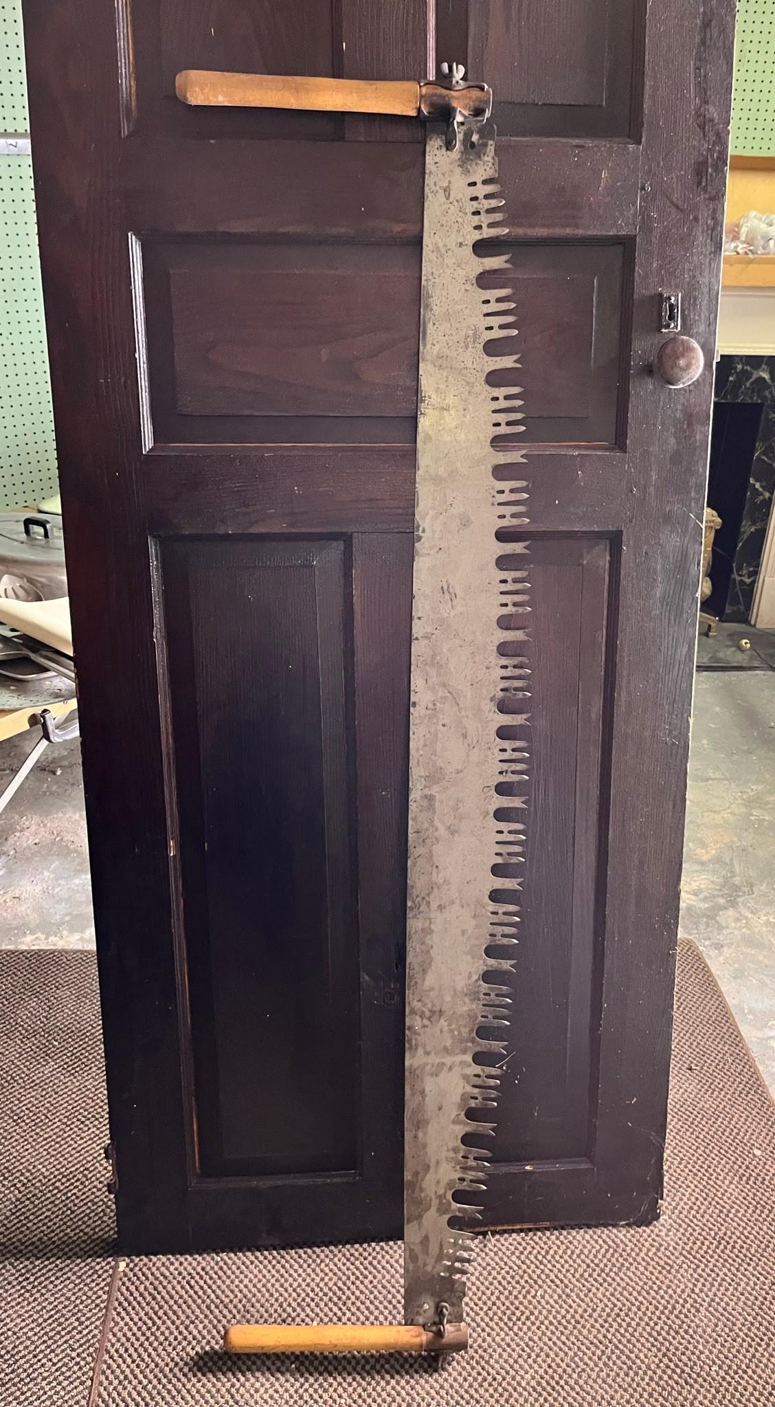 Antique Wood Door and Two Man Saw (1 of 2)